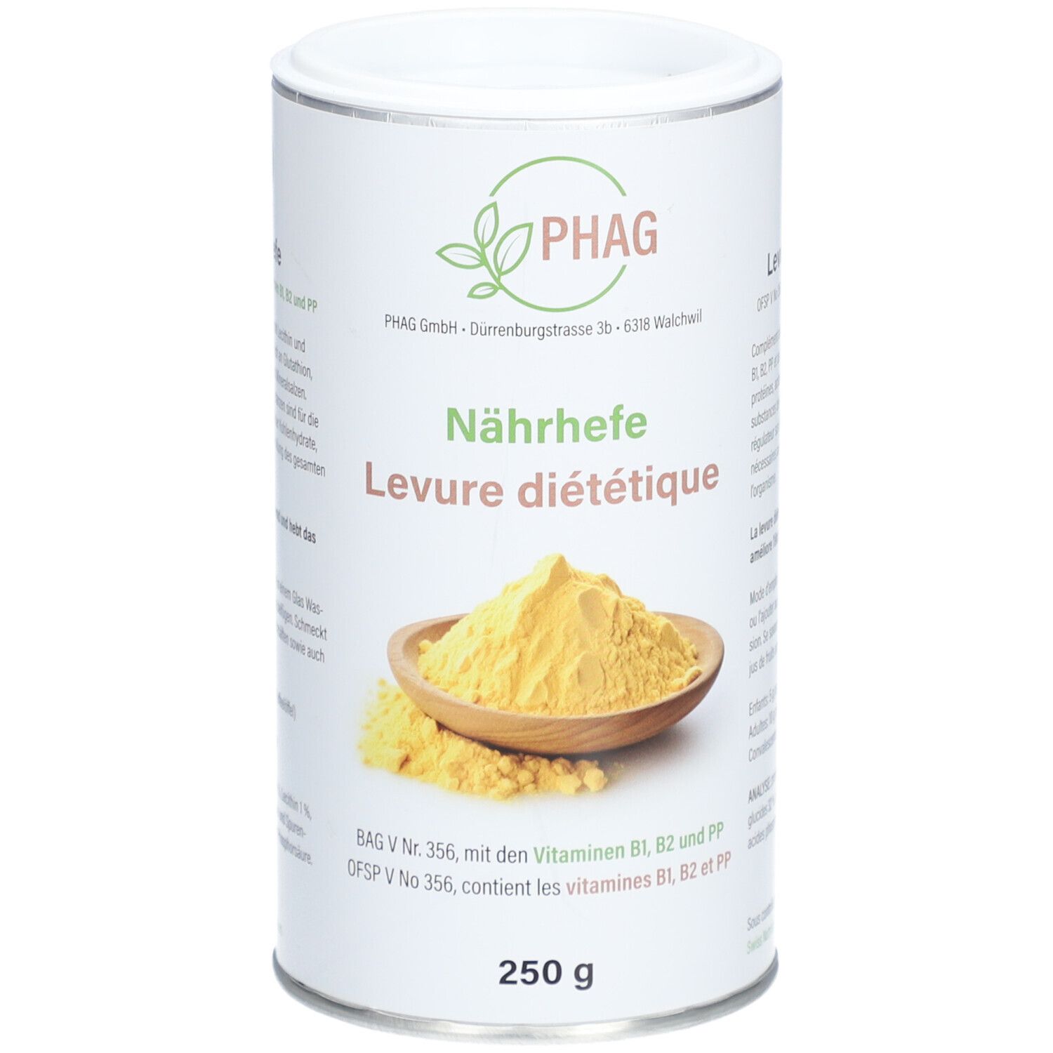 Zylinderdose mit PHAG-Logo und Aufschrift "Nährhefe Levure diététique". Darunter 250 g. Gelbes Pulver in Holzschale.