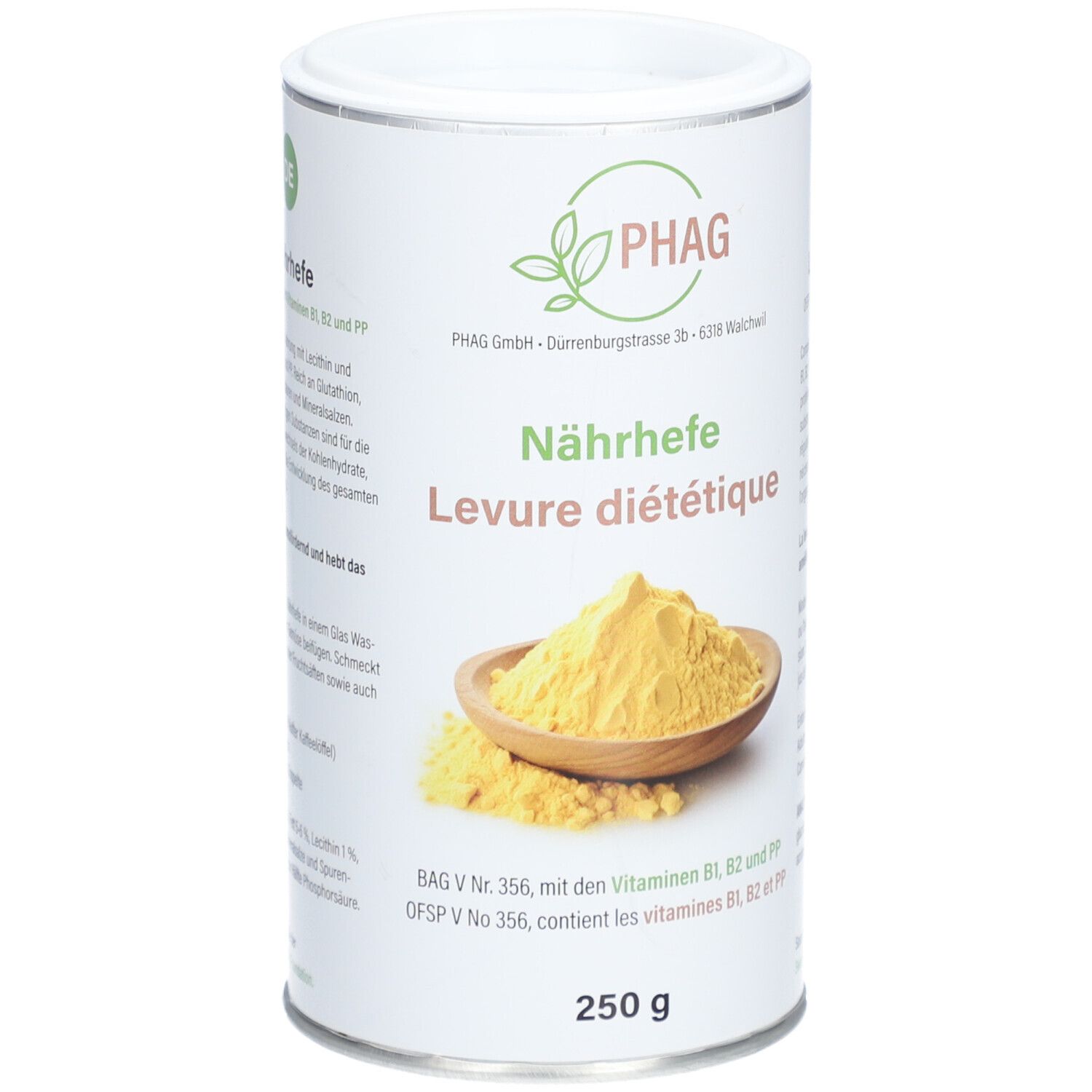 Zylinderdose mit PHAG-Logo und Aufschrift "Nährhefe Levure diététique". Darunter 250 g. Gelbes Pulver in Holzschale.