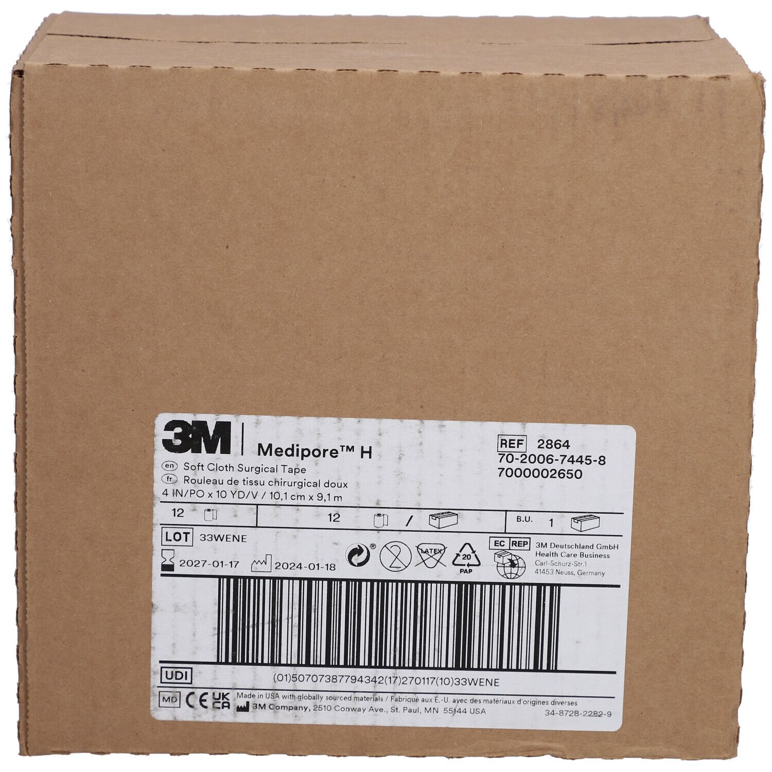 Boîte en carton avec étiquette. L'étiquette indique "3M Medipore H".