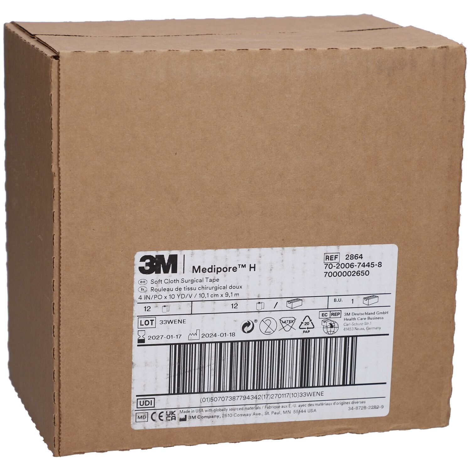 Boîte en carton avec étiquette. L'étiquette indique "3M Medipore H".