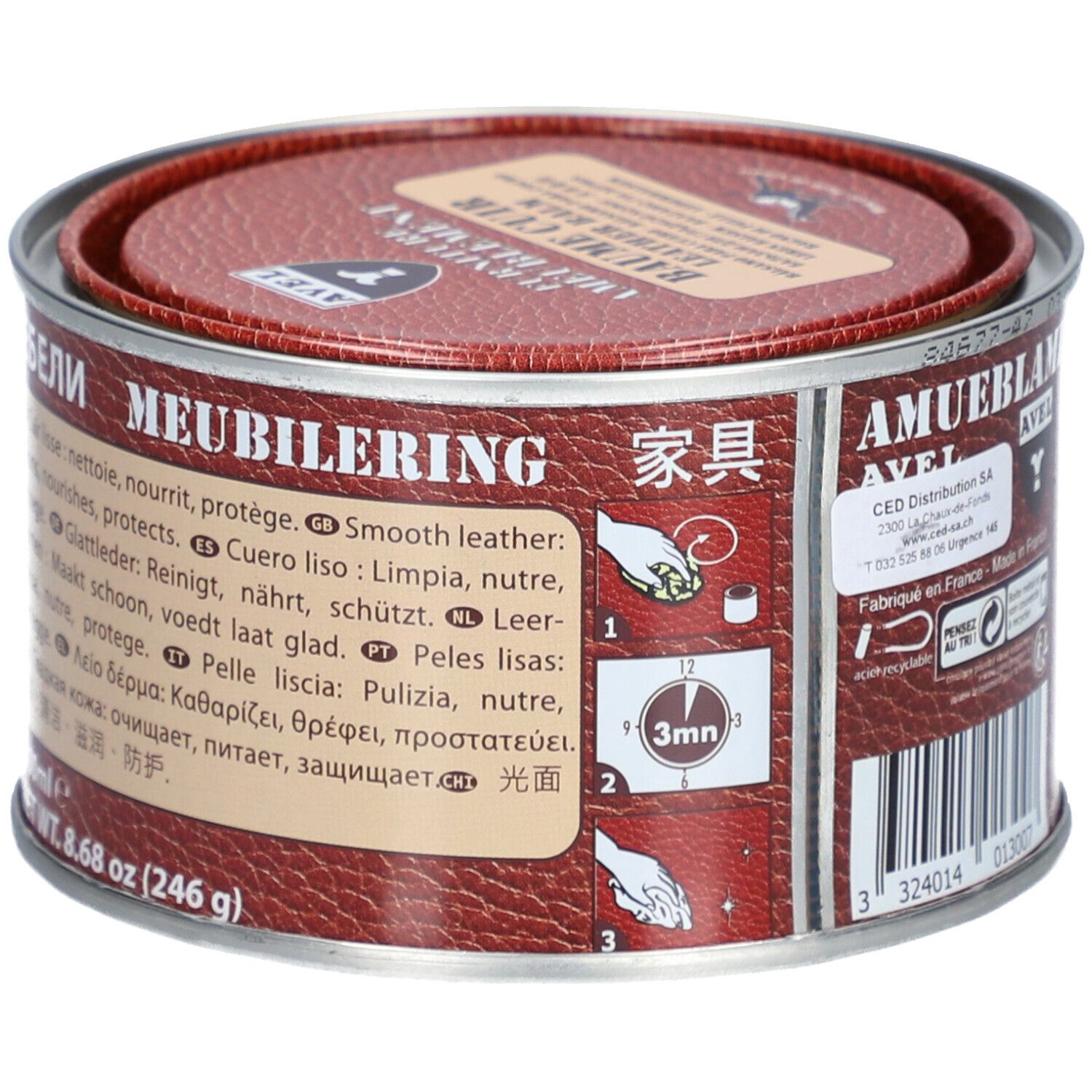 Dose mit Deckel. Aufschrift: AVEL, MEUBILIERING. Anweisungen und Informationen in mehreren Sprachen.