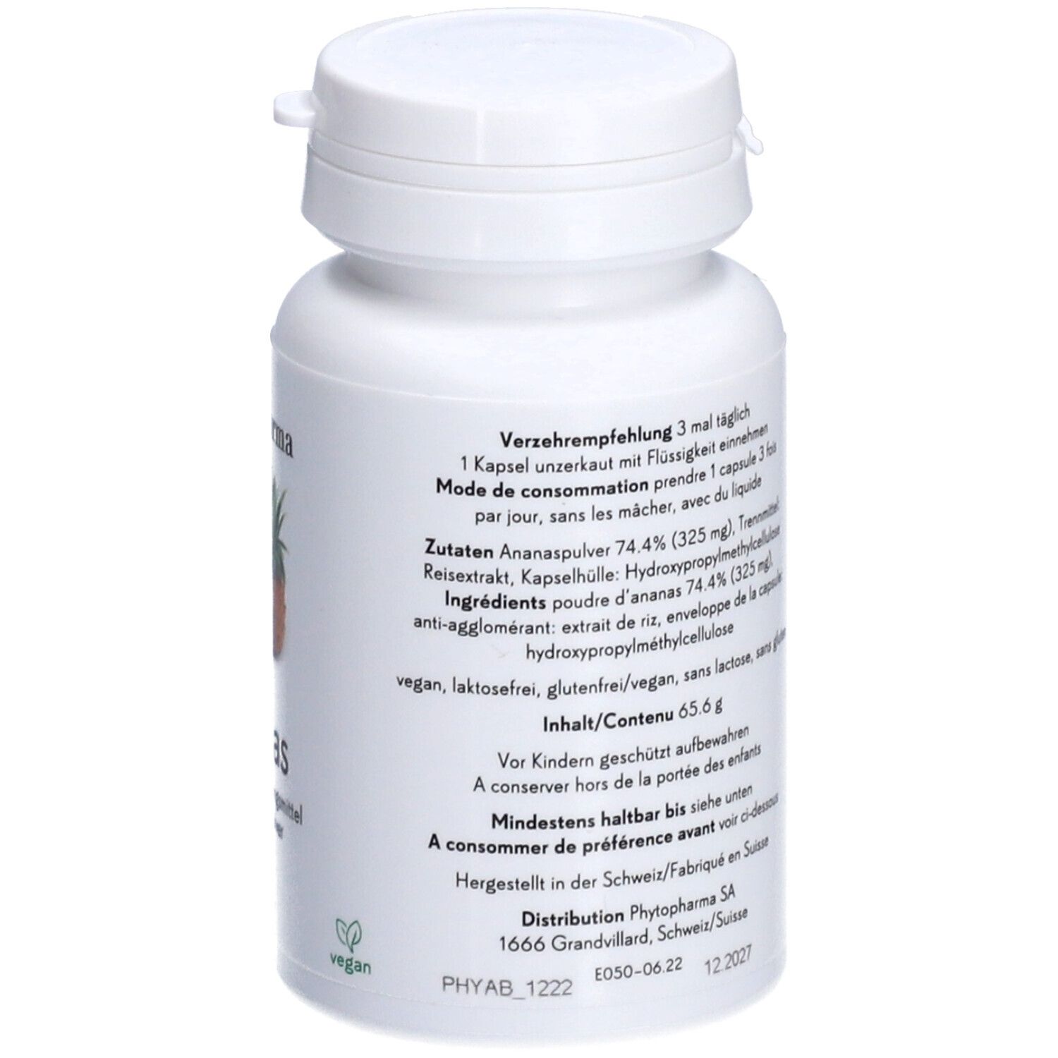 Flacon blanc de capsules. Inscription: Phytopharma, Ananas, 150 capsules, vegan. Texte et ingrédients.