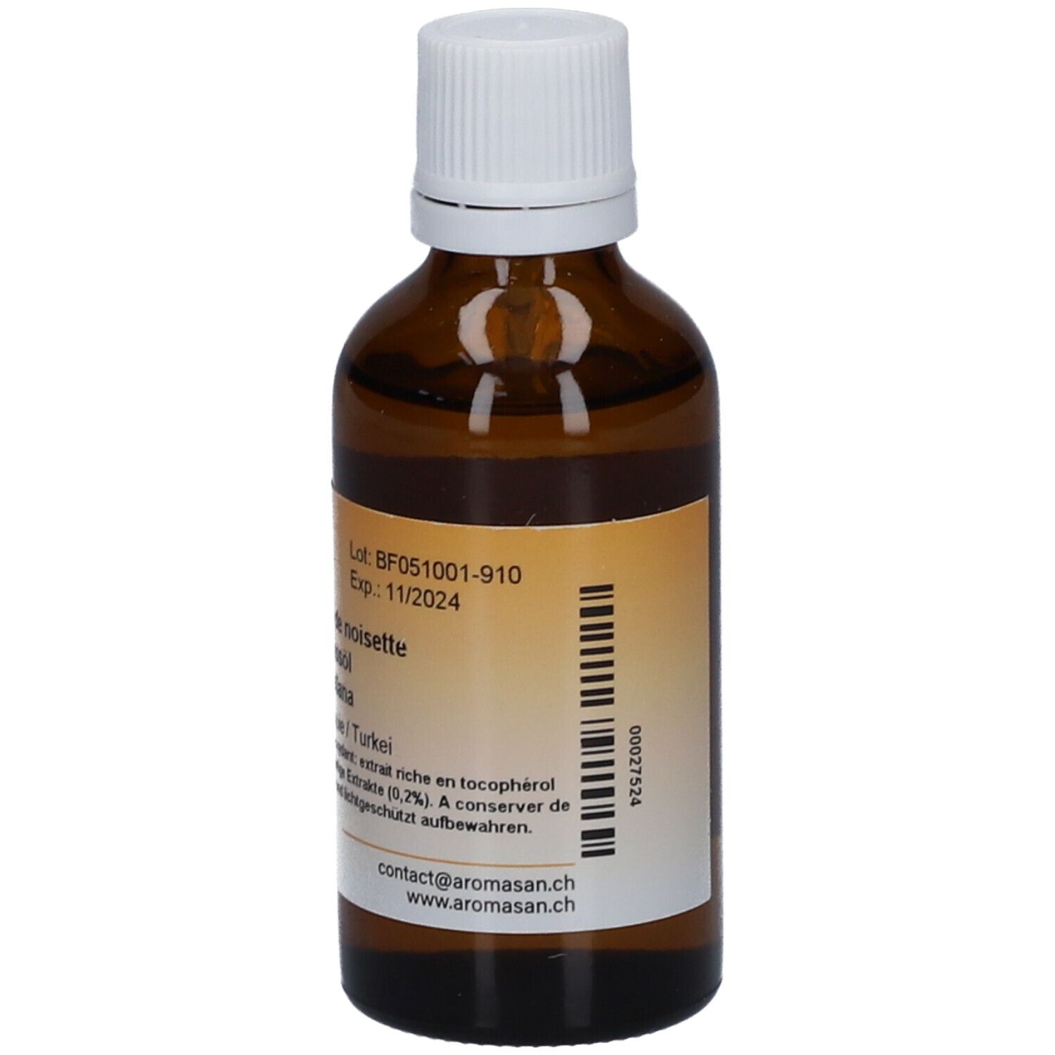 Bruine glazen fles met witte dop. Achterkant met etiket, tekst en batchnummer. Beige etiket.
