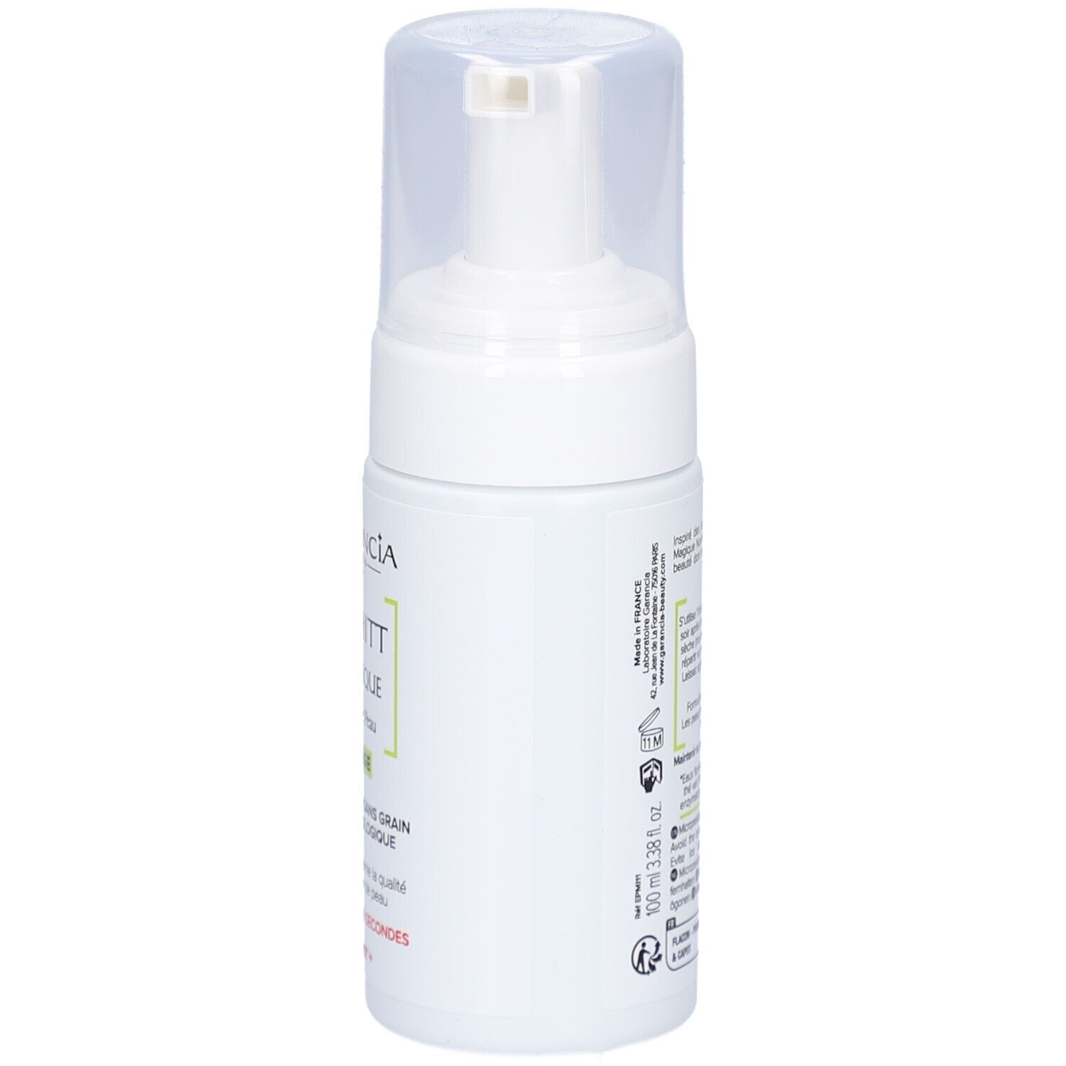 Weiße Flasche mit Sprühkopf. Aufschrift: GARANCIA, Pschitt Magique, Nouvelle Peau, Visage. Text in Französisch.