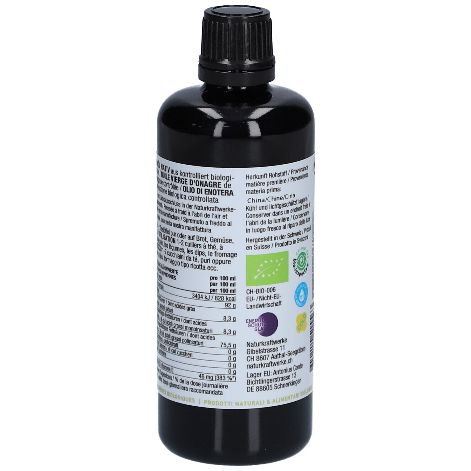 Braune Flasche mit schwarzem Deckel. Etikett mit Nährwertangaben und Inhaltsstoffen. Text in mehreren Sprachen, Bio-Siegel.