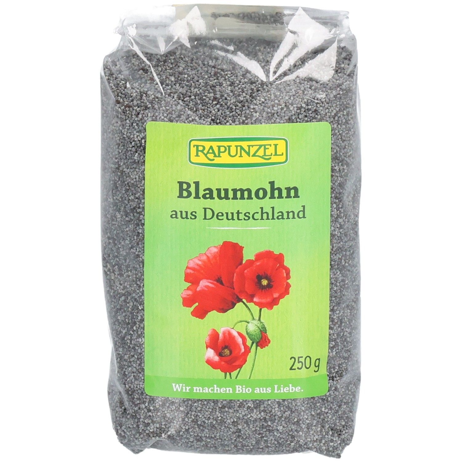 Transparente Verpackung mit Blaumohn. Grünes Etikett mit "RAPUNZEL", "Blaumohn aus Deutschland", Mohnblumen und 250g.