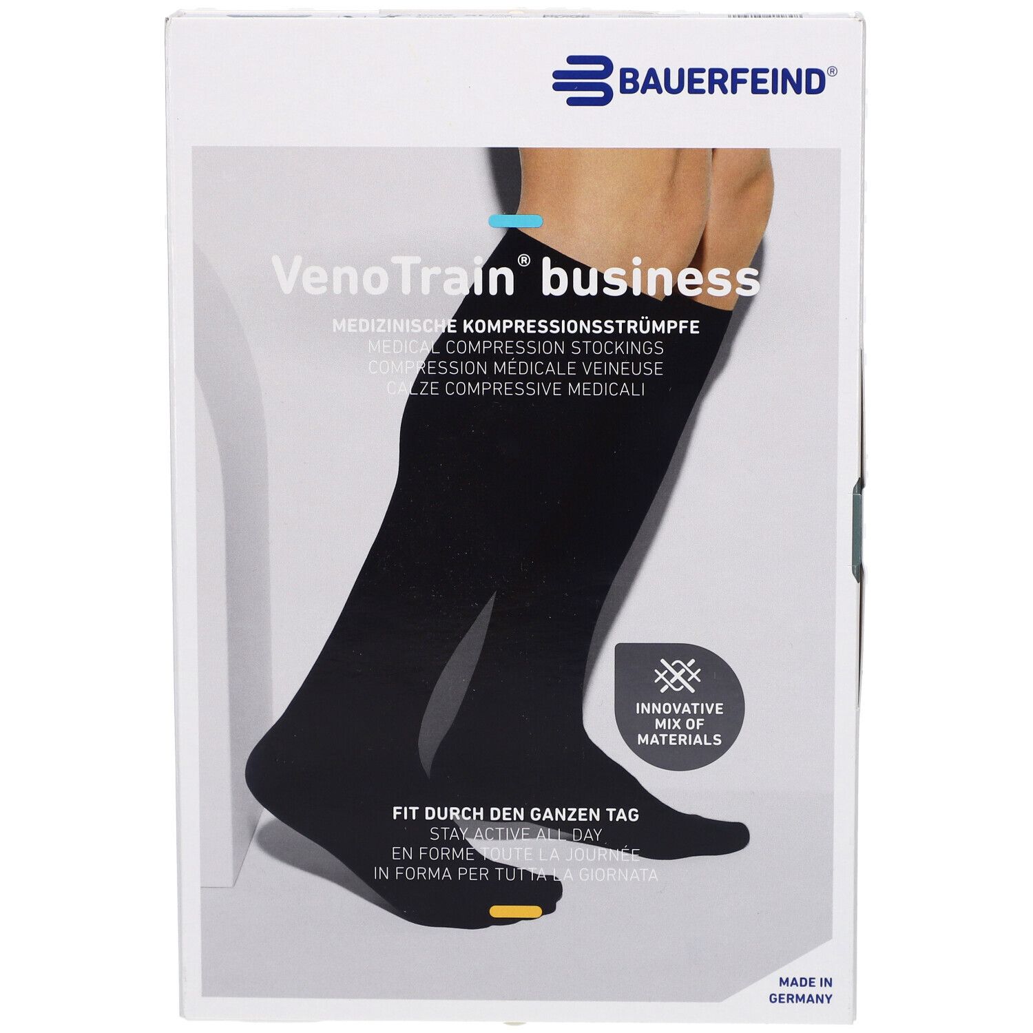 Schwarze Kompressionsstrümpfe in Verpackung. Marke: Bauerfeind. Aufdruck: VenoTrain business. Medizinische Kompressionsstrümpfe.