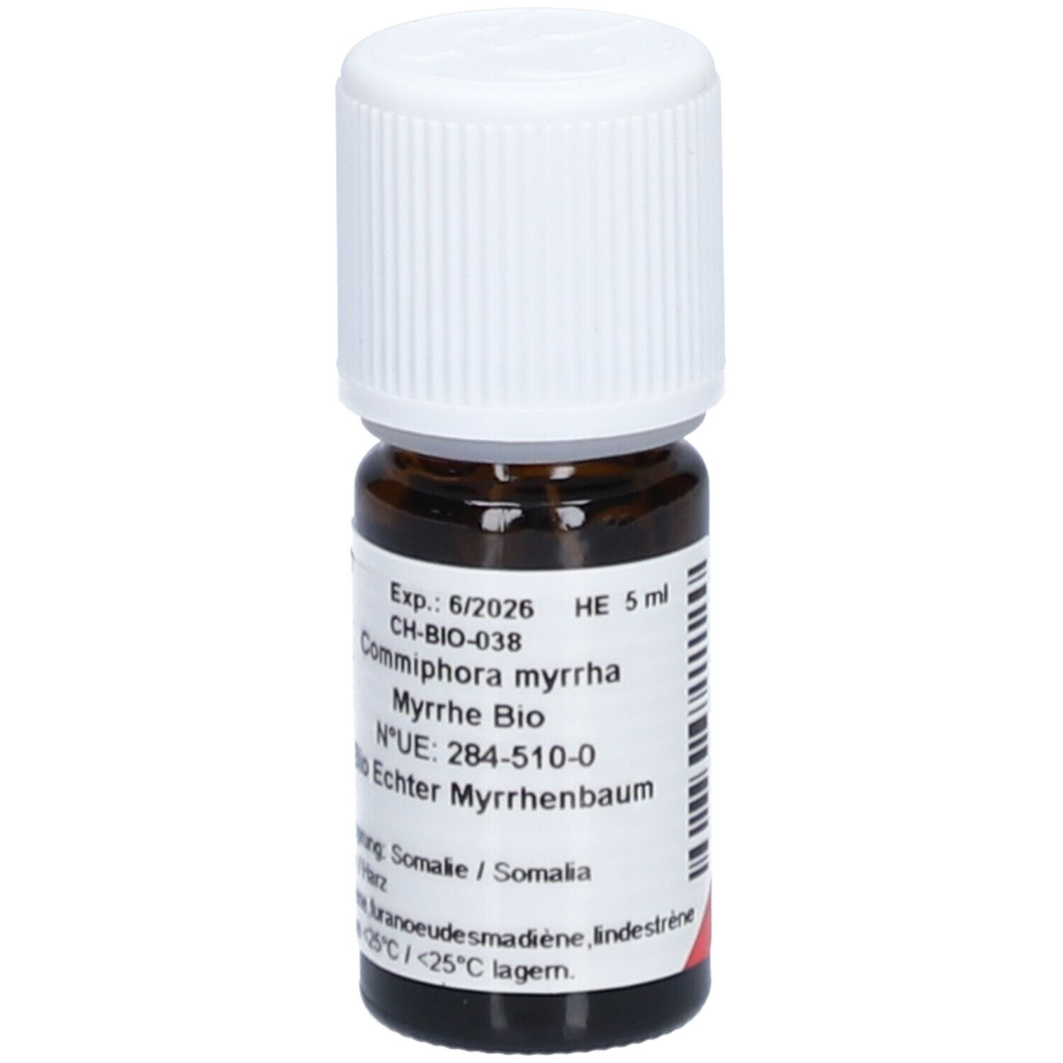 Bruine glazen fles met witte schroefdop. Etiket met tekst: Commiphora myrrha, Myrrhe Bio, HE 5 ml. Herkomst: Somalië. Gevaarsymbool.