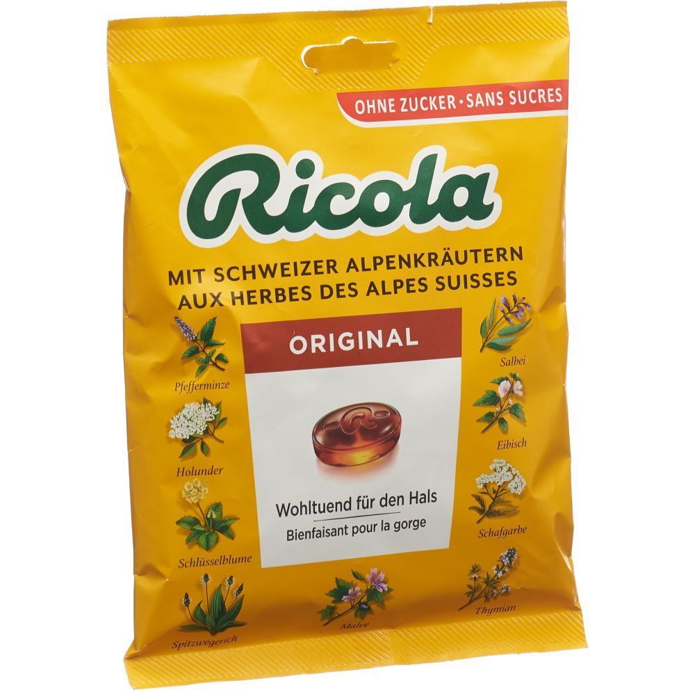 Gelbe Ricola-Beutel. Aufdruck: Ricola, Original, Kräuterbonbons. Einzelne Kräuterabbildungen. Ohne Zucker.