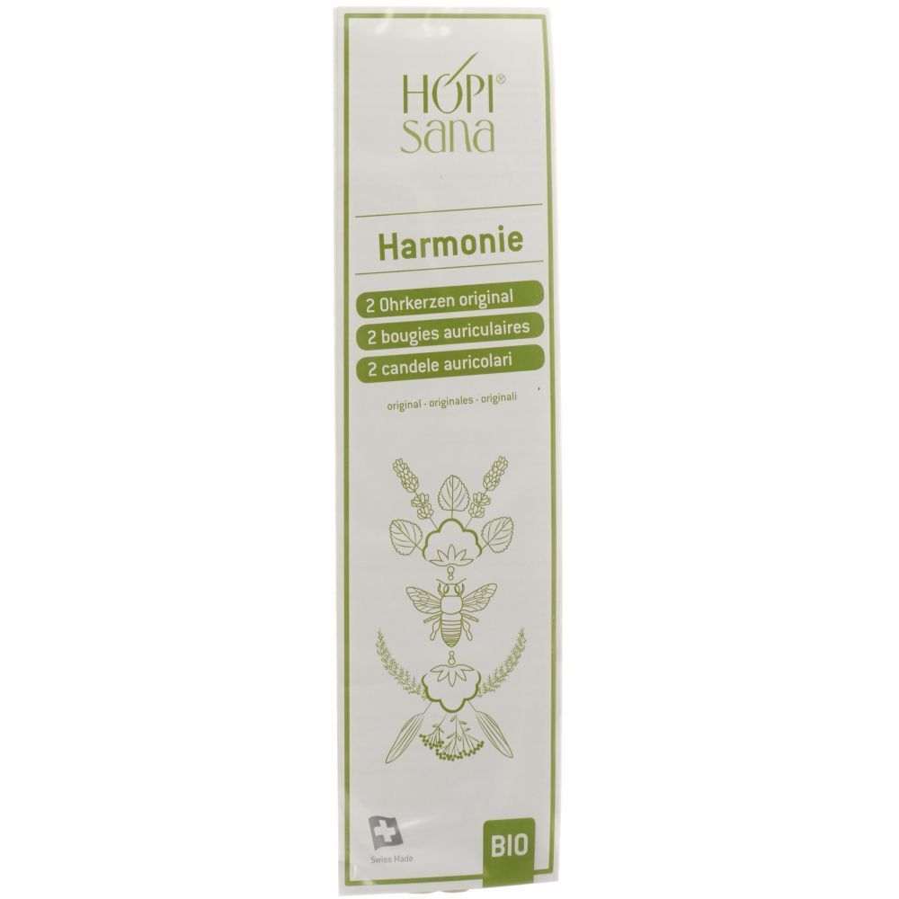 Emballage avec nom et logo du produit. Contient 2 bougies auriculaires. Design vert et blanc avec illustrations florales et label bio.