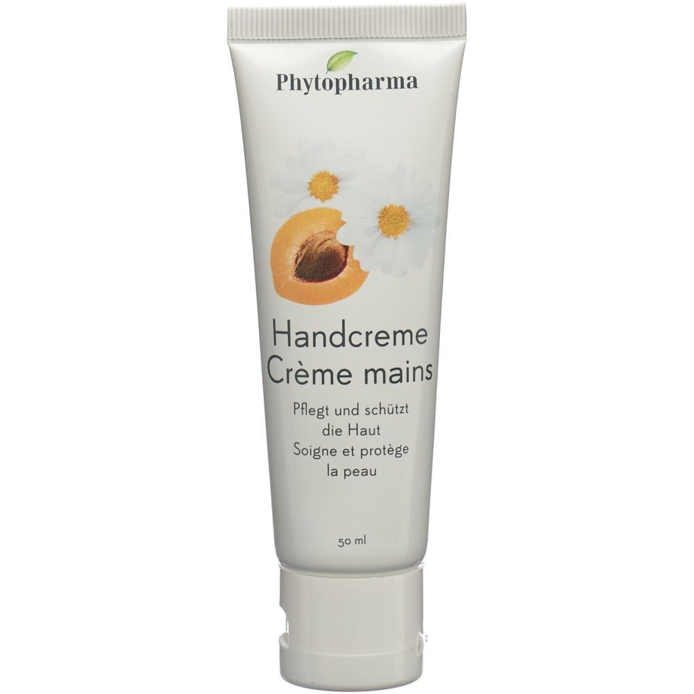 Tube blanc PHYTOPHARMA Handcreme. Impression de fleurs de camomille et d'abricot. Texte : Handcreme, Crème mains. 50 ml.