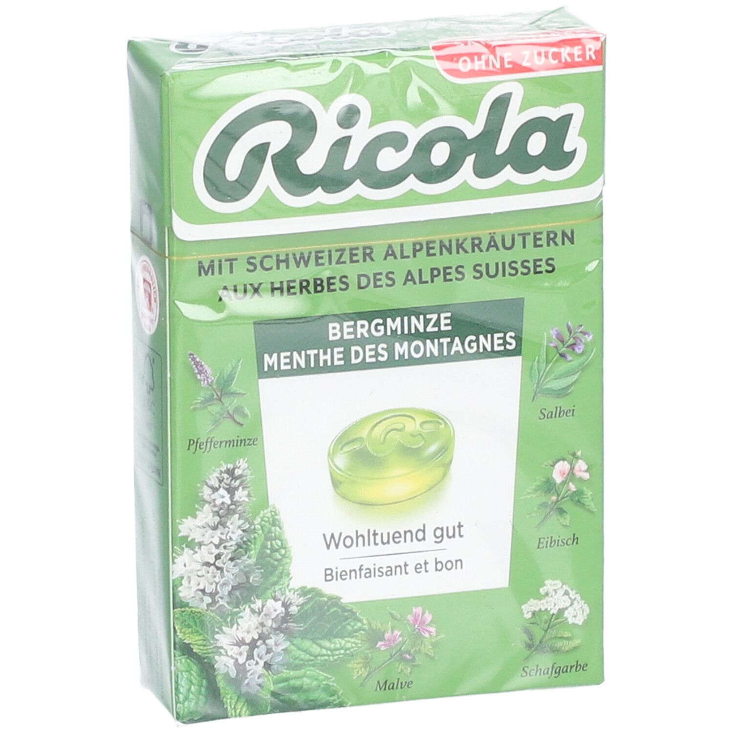 Grüne Ricola-Verpackung mit Bergminze-Bonbons. Text: Ohne Zucker, Schweizer Alpenkräuter. Einzelnes Bonbon sichtbar.