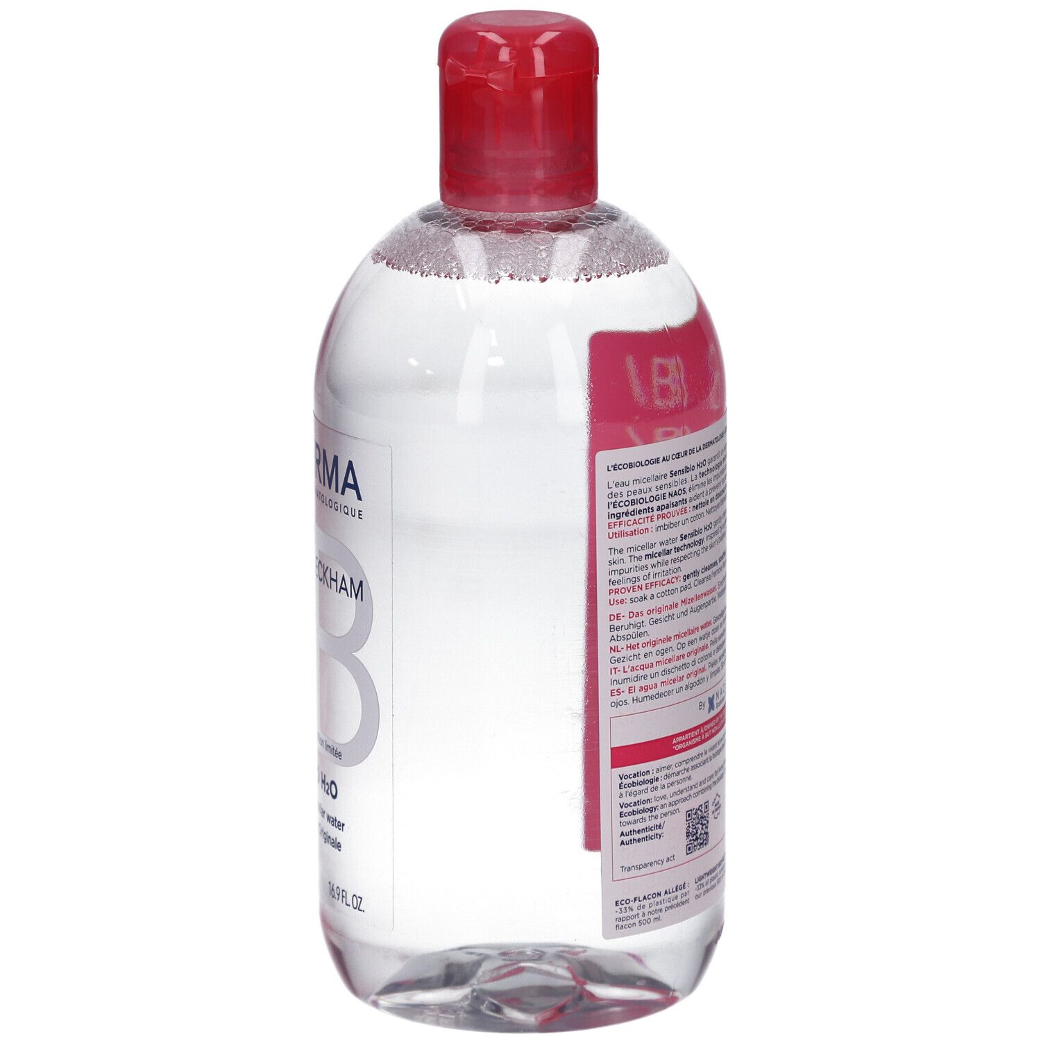 Rückseite der Flasche. Etikett mit Text. Roter Deckel. Transparente Flüssigkeit. Marke: BIODERMA.