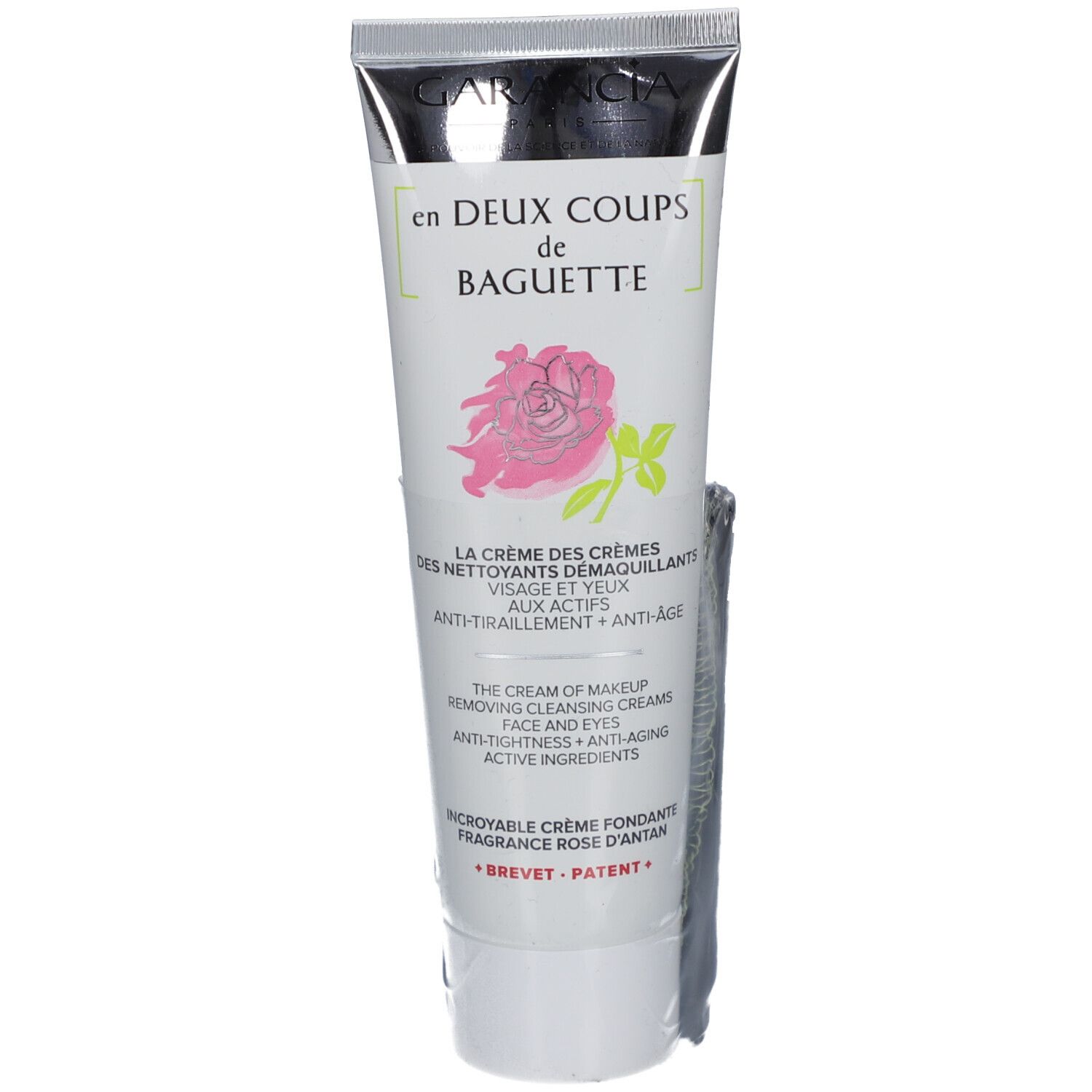 Tube mit Produkttext und Rose-Illustration. Marke GARANCIA. Text: en Deux Coups de Baguette. Creme für Gesicht und Augen.