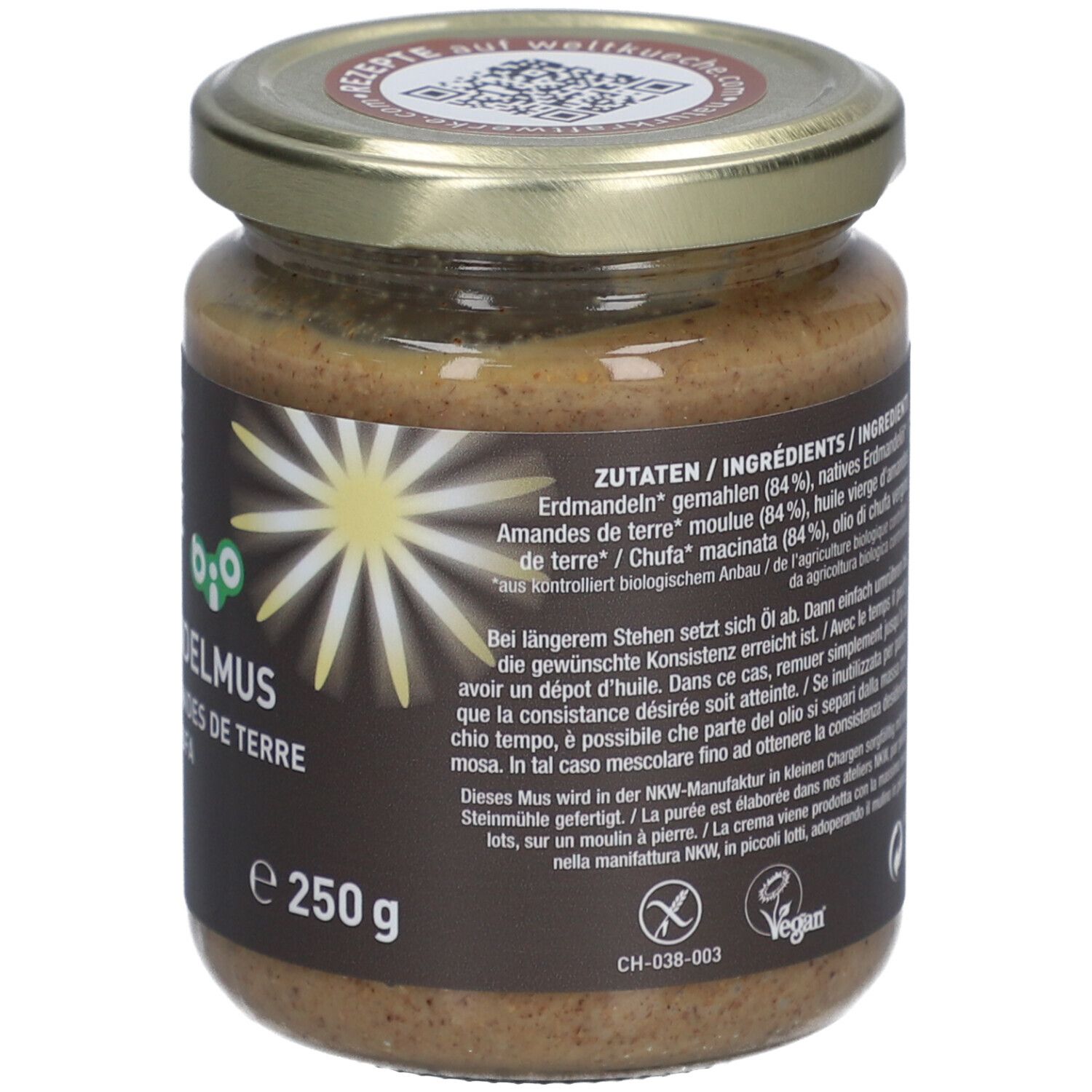 Pot de purée d'amandes de terre. Couvercle imprimé. Étiquette avec nom du produit, marque et label bio.