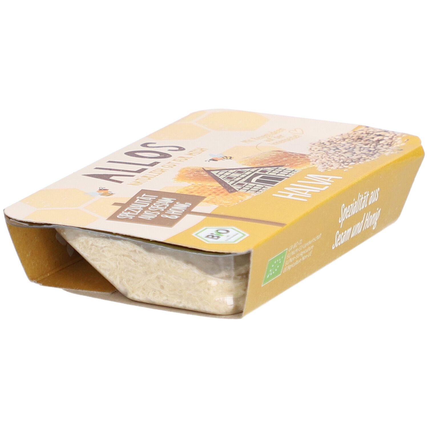 Halva-Verpackung. Gelbe Verpackung mit Aufschrift "Spezialität aus Sesam & Honig". Bio-Siegel.