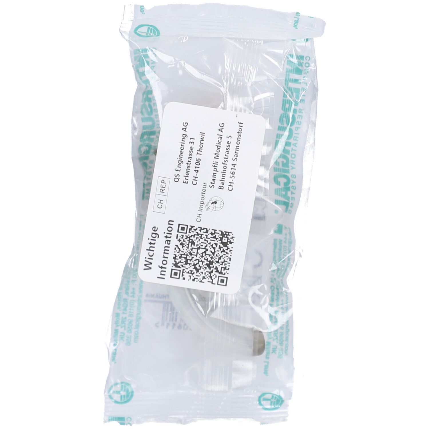 Guedeltubus in transparenter Verpackung. Ein weißes Etikett mit Informationen und QR-Code ist angebracht.