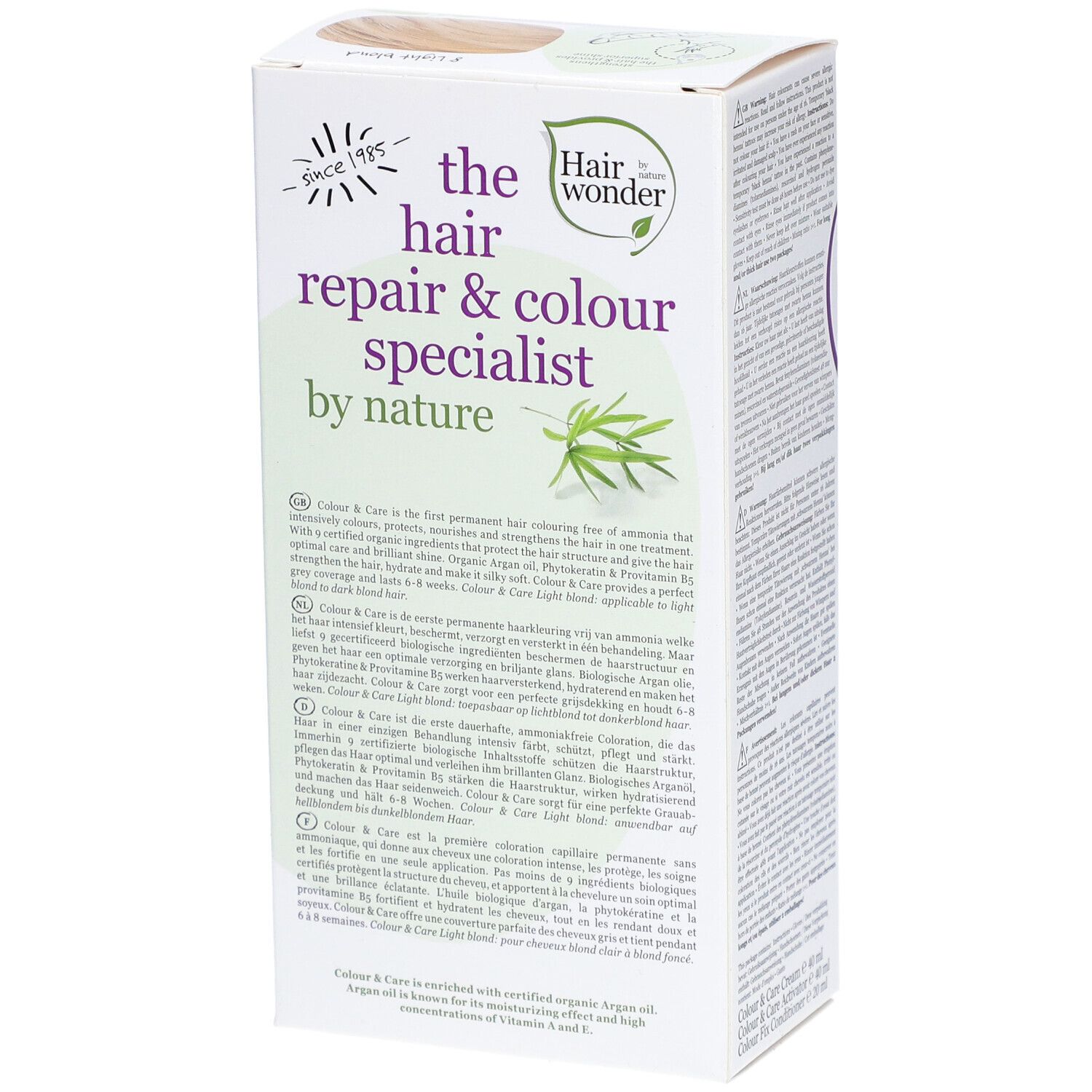Haarfärbemittel-Verpackung. Aufdruck: the hair repair & colour specialist by nature. Text und Logo. Seitenansicht.