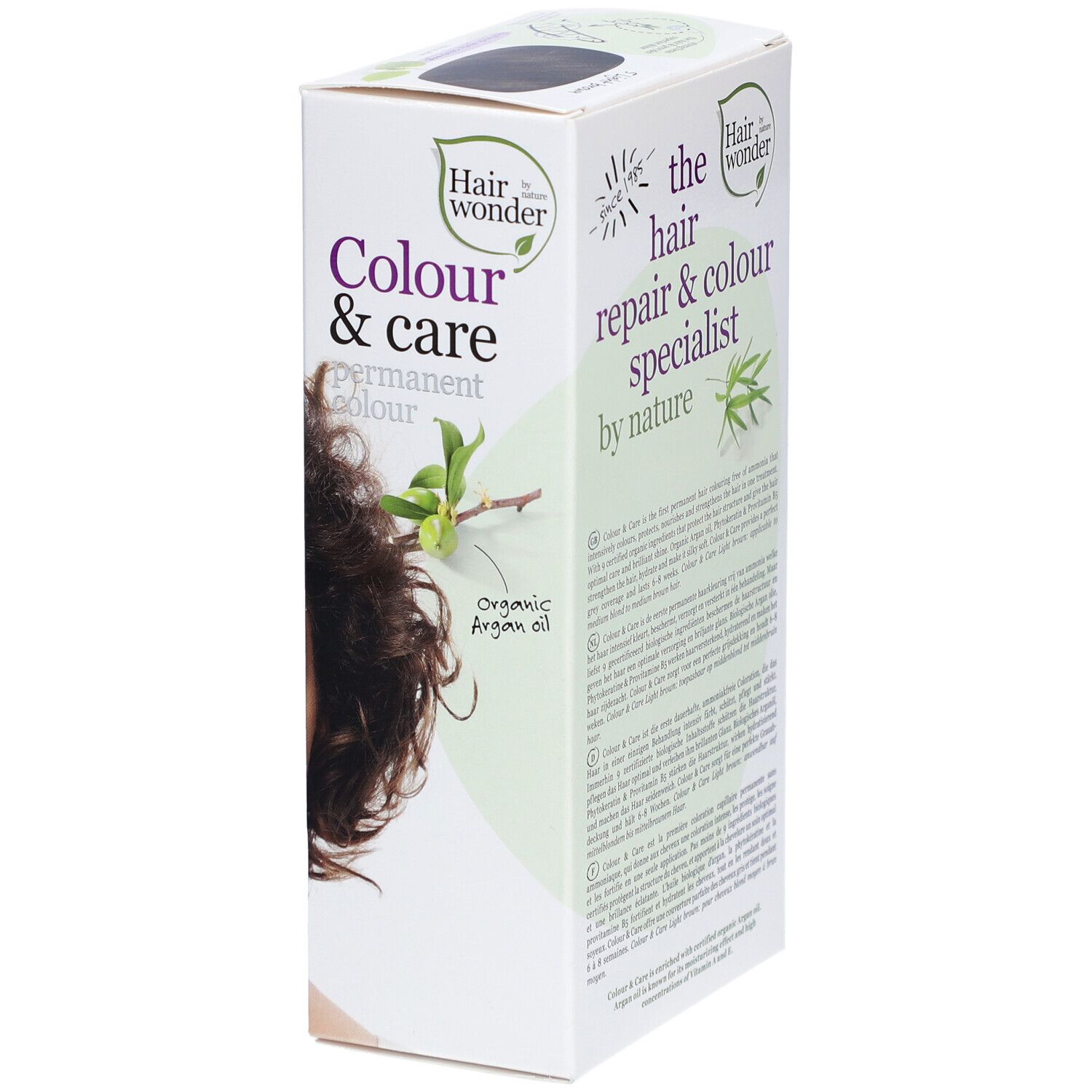 Boîte de coloration capillaire permanente. Inscription : Colour & care. Vue latérale. Logo : Hair by nature wonder. Texte sur les ingrédients. Sans ammoniaque.