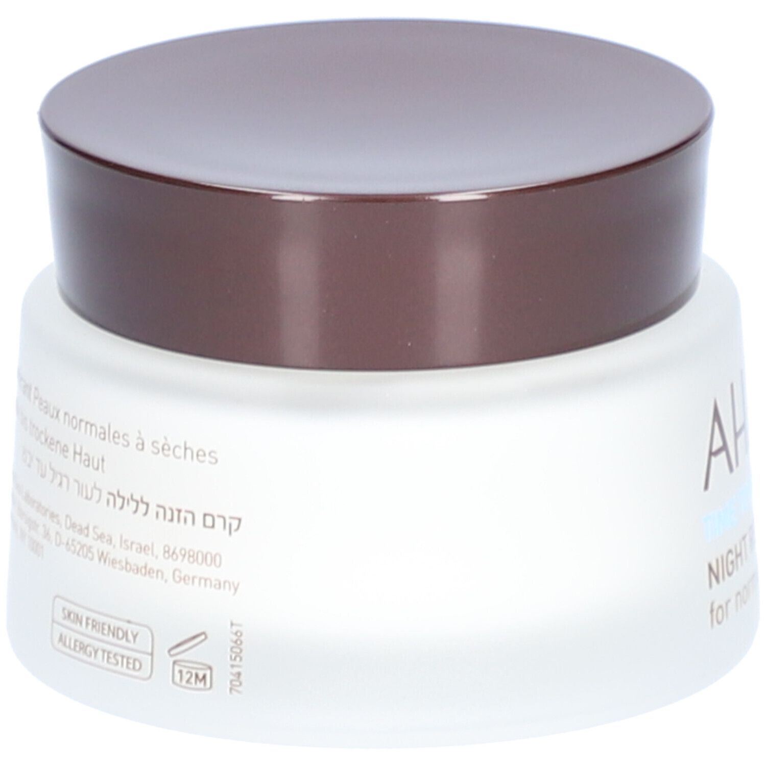 Rückseite eines Creme-Glases mit braunem Deckel. Text in mehreren Sprachen. Aufschrift: SKIN FRIENDLY, ALLERGY TESTED.