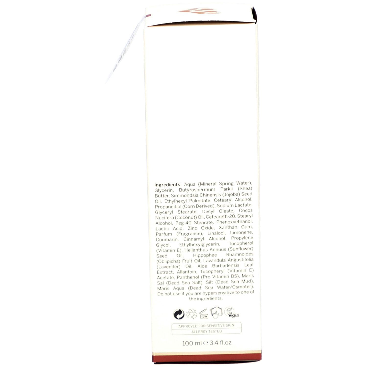 Produktverpackung. Zutatenliste. Text: Aqua, Mineral Spring Water. Karton.