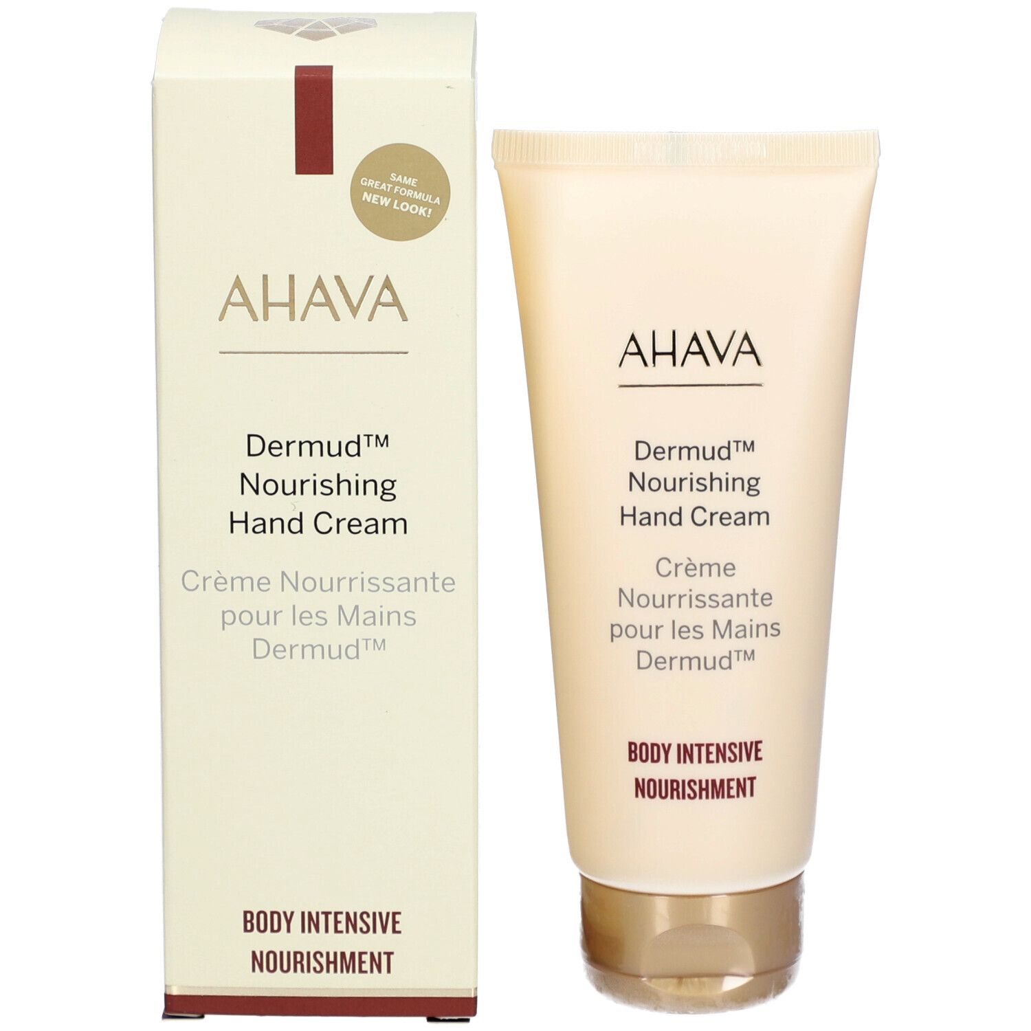 Produkt und Verpackung. Tube und Schachtel. Text: AHAVA, Dermud Hand Cream, Crème Nourrissante. Beige und rot.