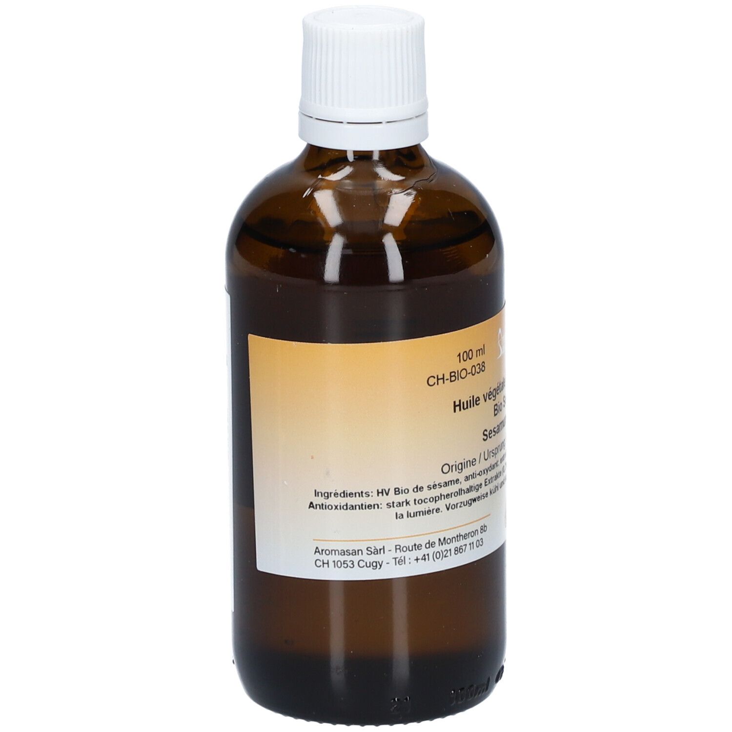 Braune Glasflasche mit weißem Verschluss. Rückseite mit Etikett und Produktinformationen. Zutatenliste und Herstelleradresse.