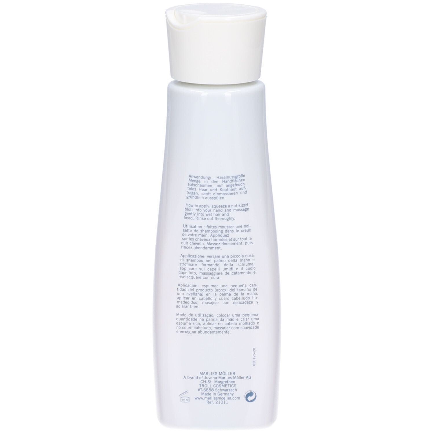 Rückseite der Shampoo-Flasche. Text in mehreren Sprachen. Für coloriertes Haar.