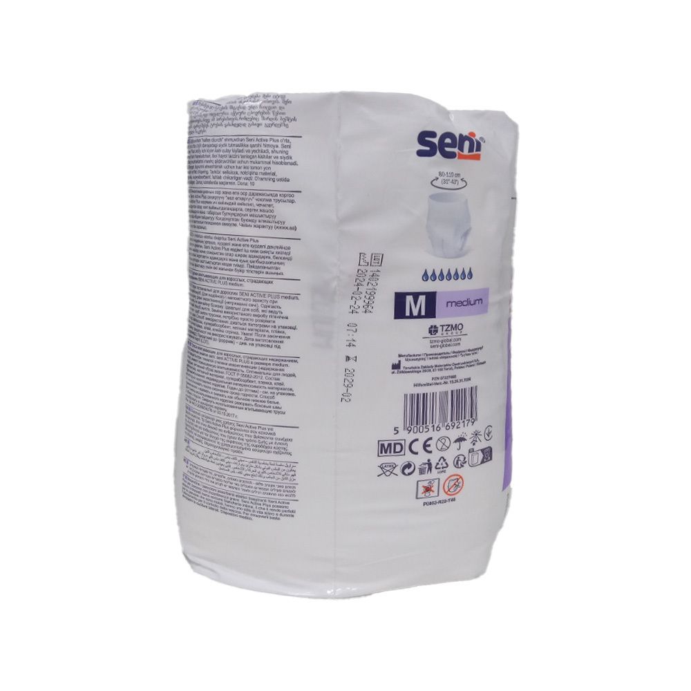Rückseite der SENI Active Plus Pants M Verpackung. Weiße Verpackung mit Text und Logo. Seitliche Ansicht.