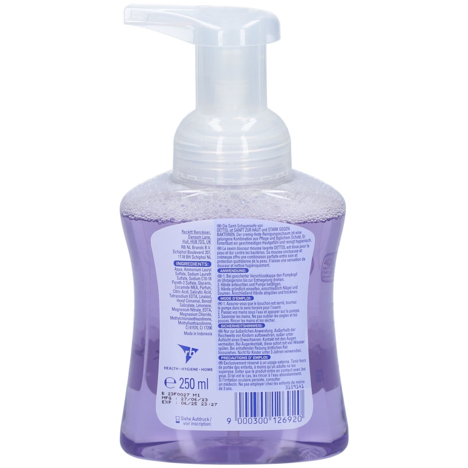 Dos du flacon de savon mousse. Étiquette avec texte et code-barres. Liquide violet visible.