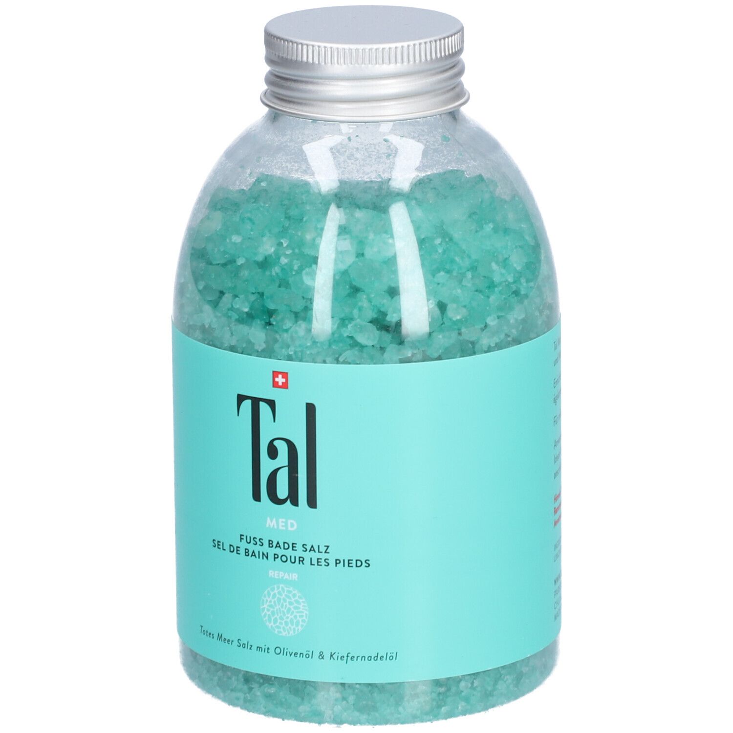Flacon transparent rempli de cristaux bleu-vert. Étiquette turquoise avec texte blanc: Tal, Sel de bain pour les pieds, Med.
