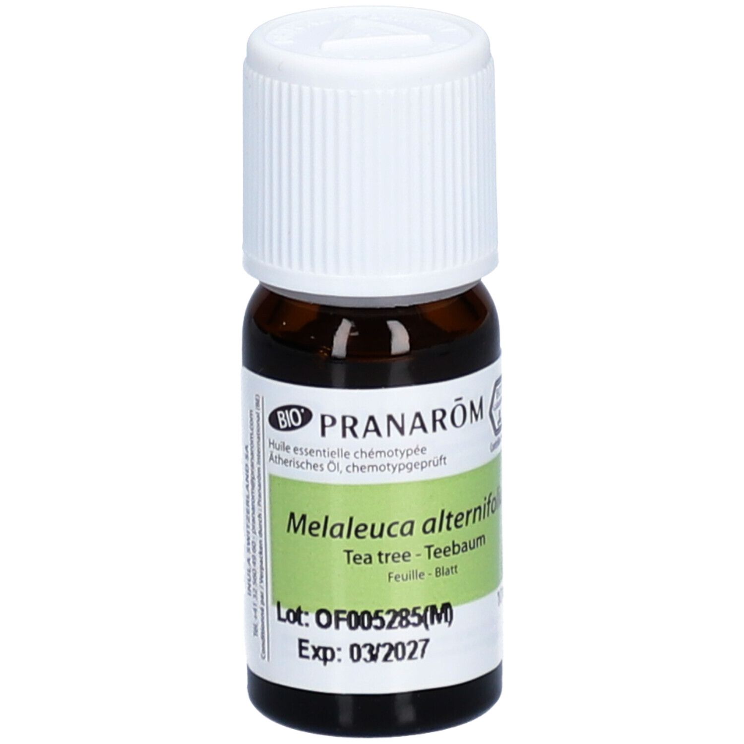 Flacon en verre brun avec bouchon blanc. Étiquette avec nom du produit, nom botanique et numéro de lot. Certification bio.