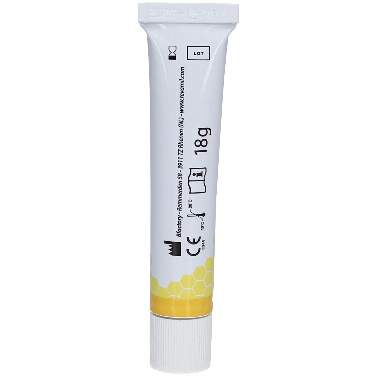Dos du tube. Inscription : 18g, Revamil, informations et symboles.