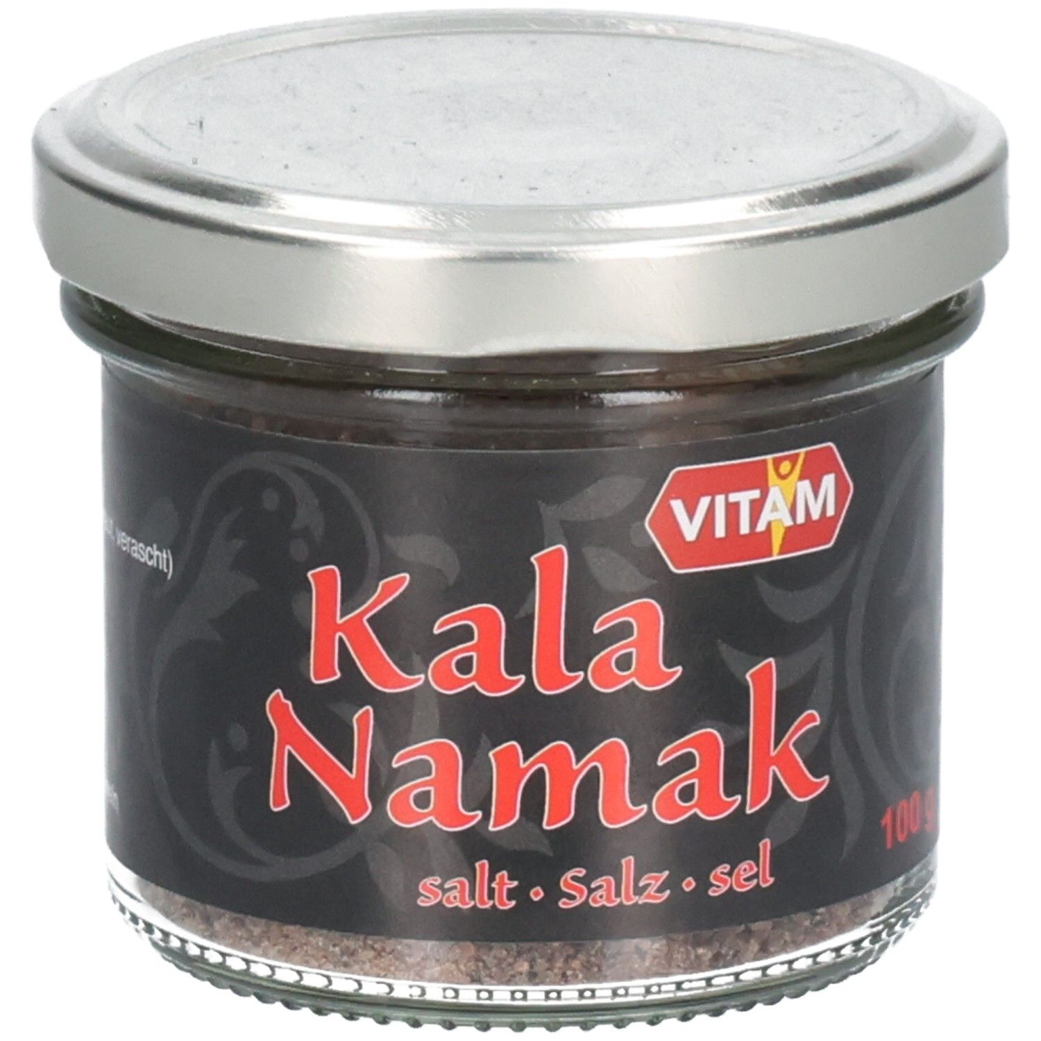 Glas mit schwarzem Etikett. Roter Schriftzug "Kala Namak". Marke VITAM. Deckel silberfarben. Salz sichtbar.