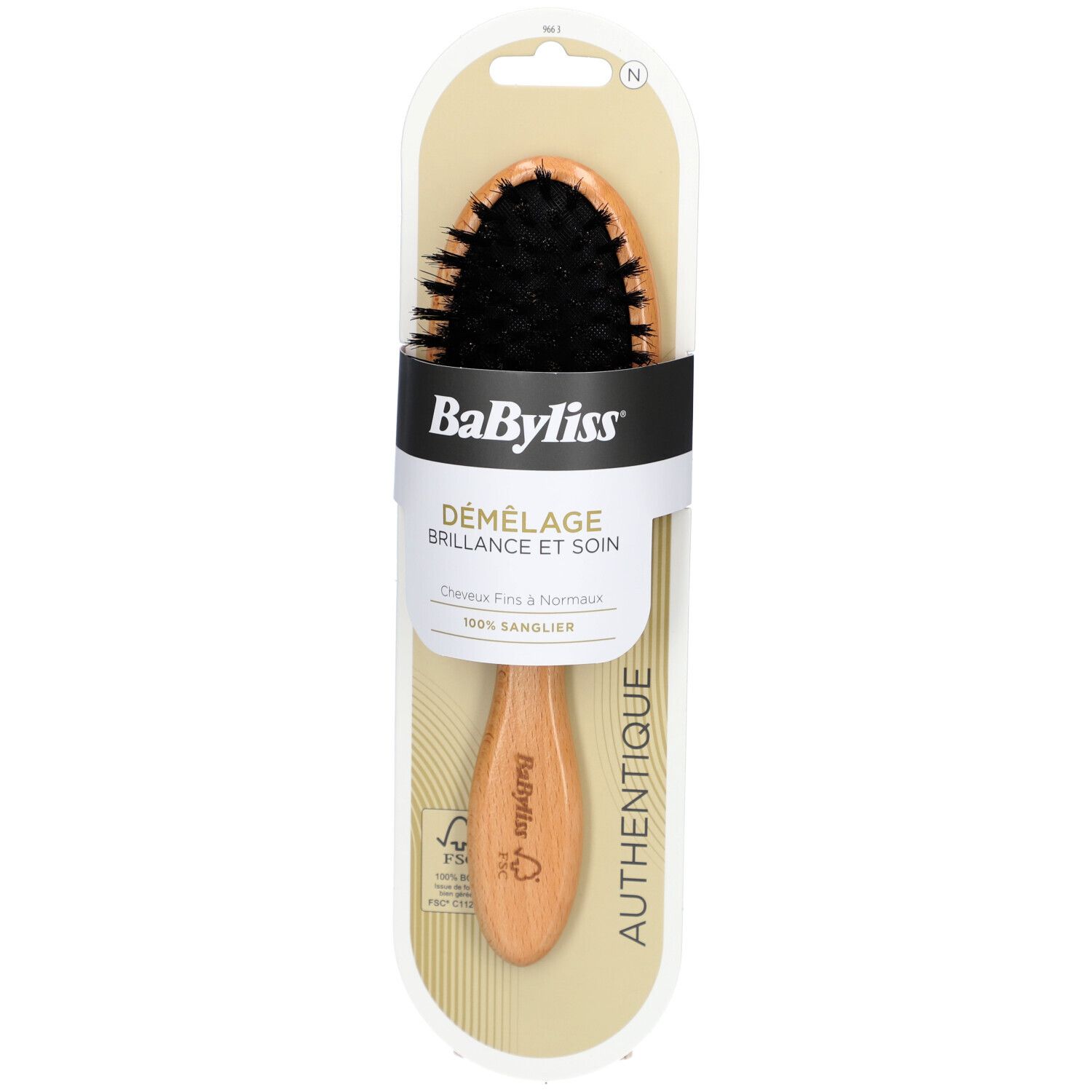 Brosse en bois avec soies de sanglier, emballage. Soies noires, manche en bois avec logo. Texte: DÉMÉLAGE, BRILLANCE ET SOIN.