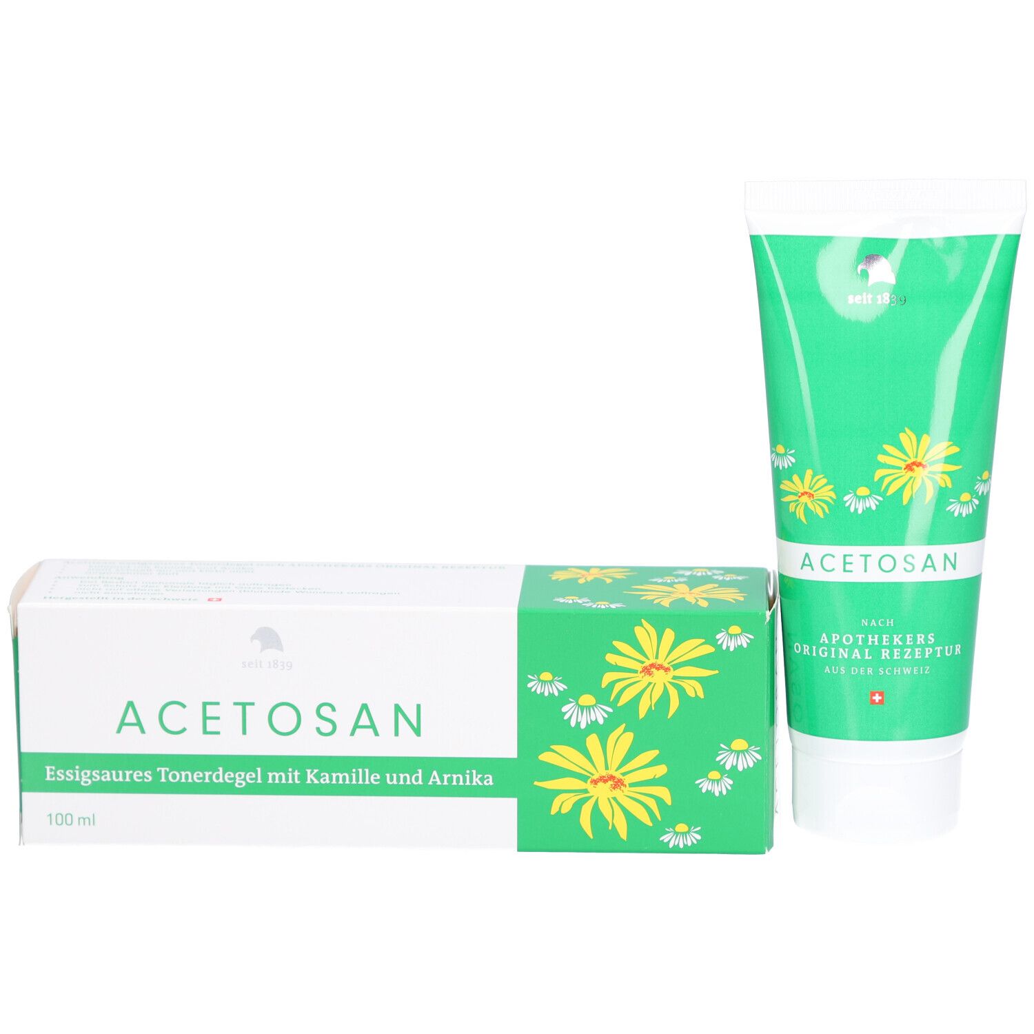 Produktverpackung mit Tube und zwei Schachteln. Aufschrift: Acetosan, Kamille und Arnika. Schweizer Kreuz.