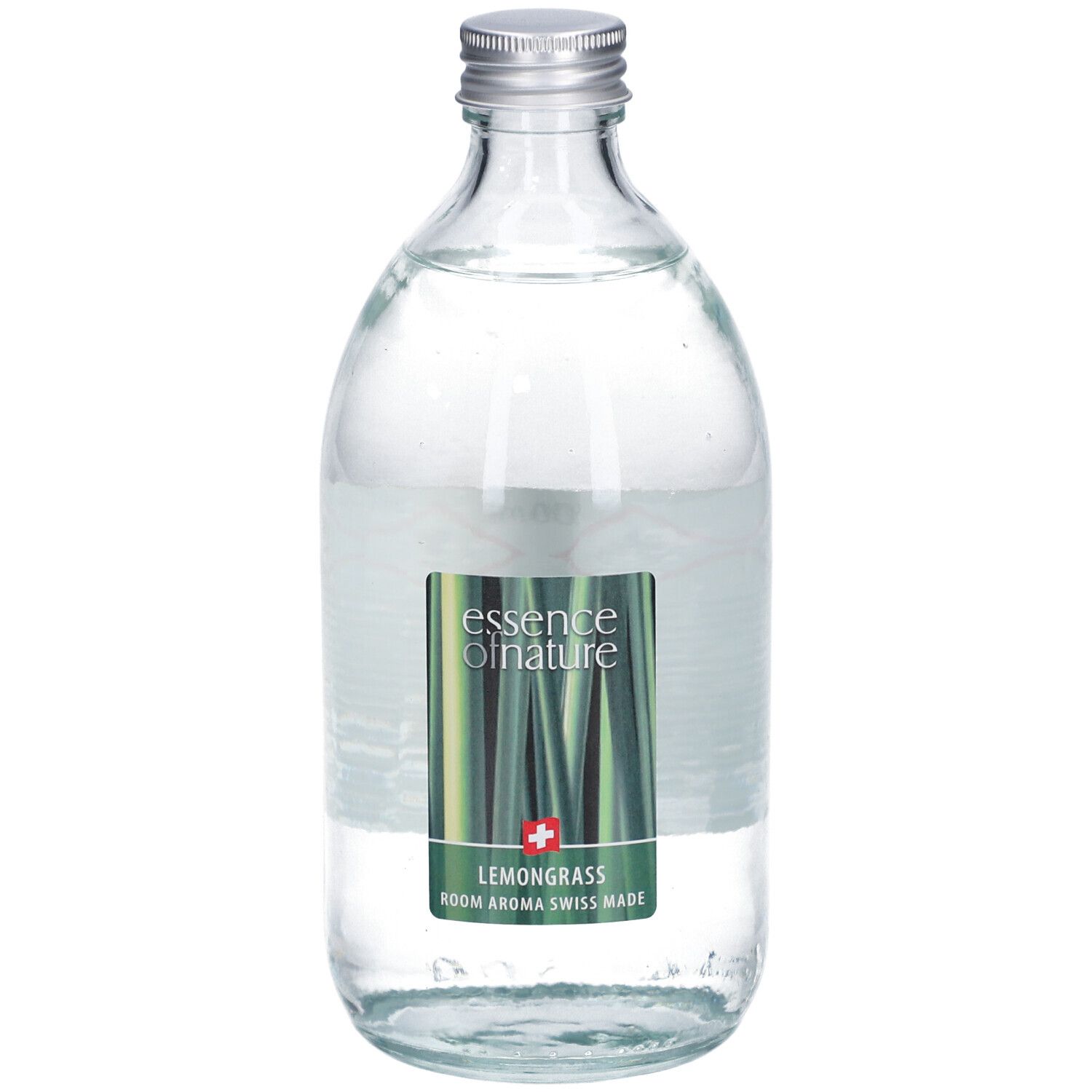 Glasflasche mit silbernem Deckel. Etikett mit Produktnamen und Logo. Klarer Inhalt. Swiss Made.