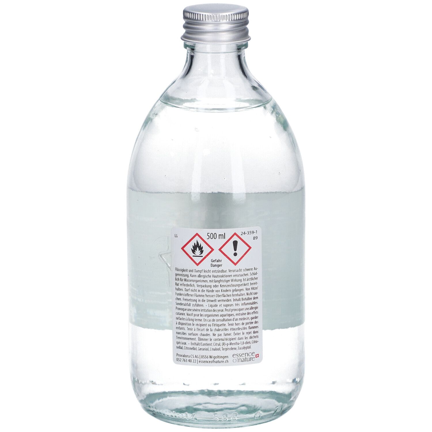 Glasflasche mit silbernem Deckel. Rückseite mit Warnsymbolen und Text. Klarer Inhalt. 500 ml.