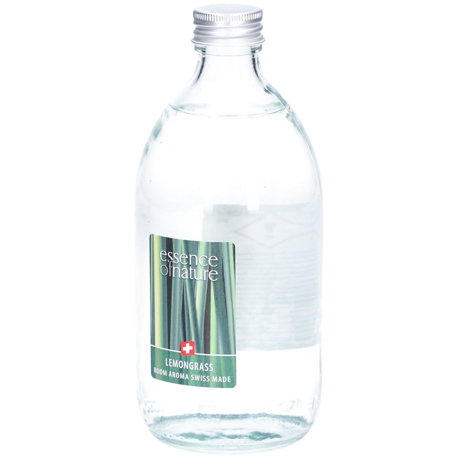 Glasflasche mit silbernem Deckel. Etikett mit Produktnamen und Logo. Klarer Inhalt. Swiss Made.