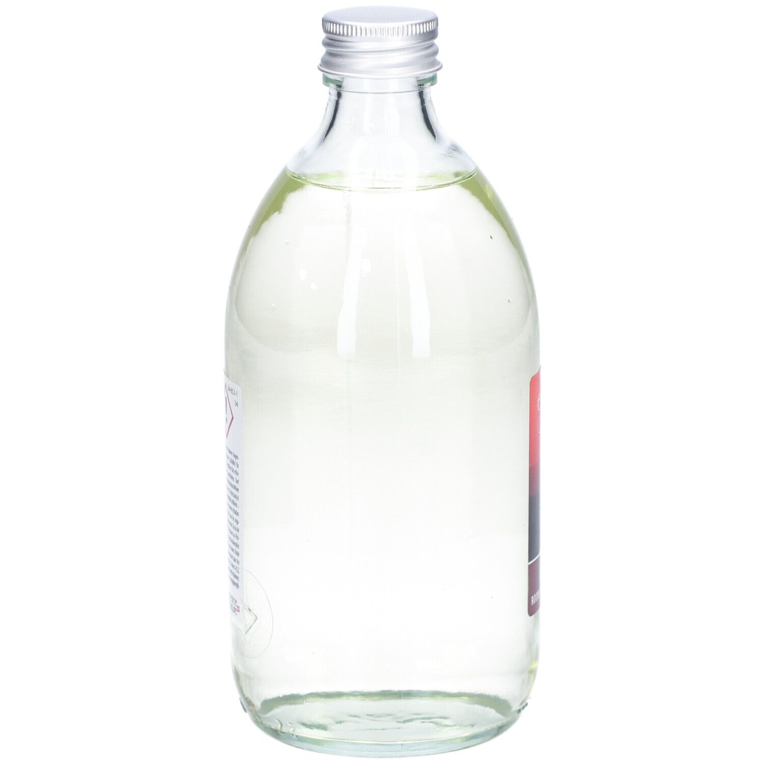 Flacon en verre avec liquide. Autocollant avec symboles d'avertissement et texte. Bouchon métallique.