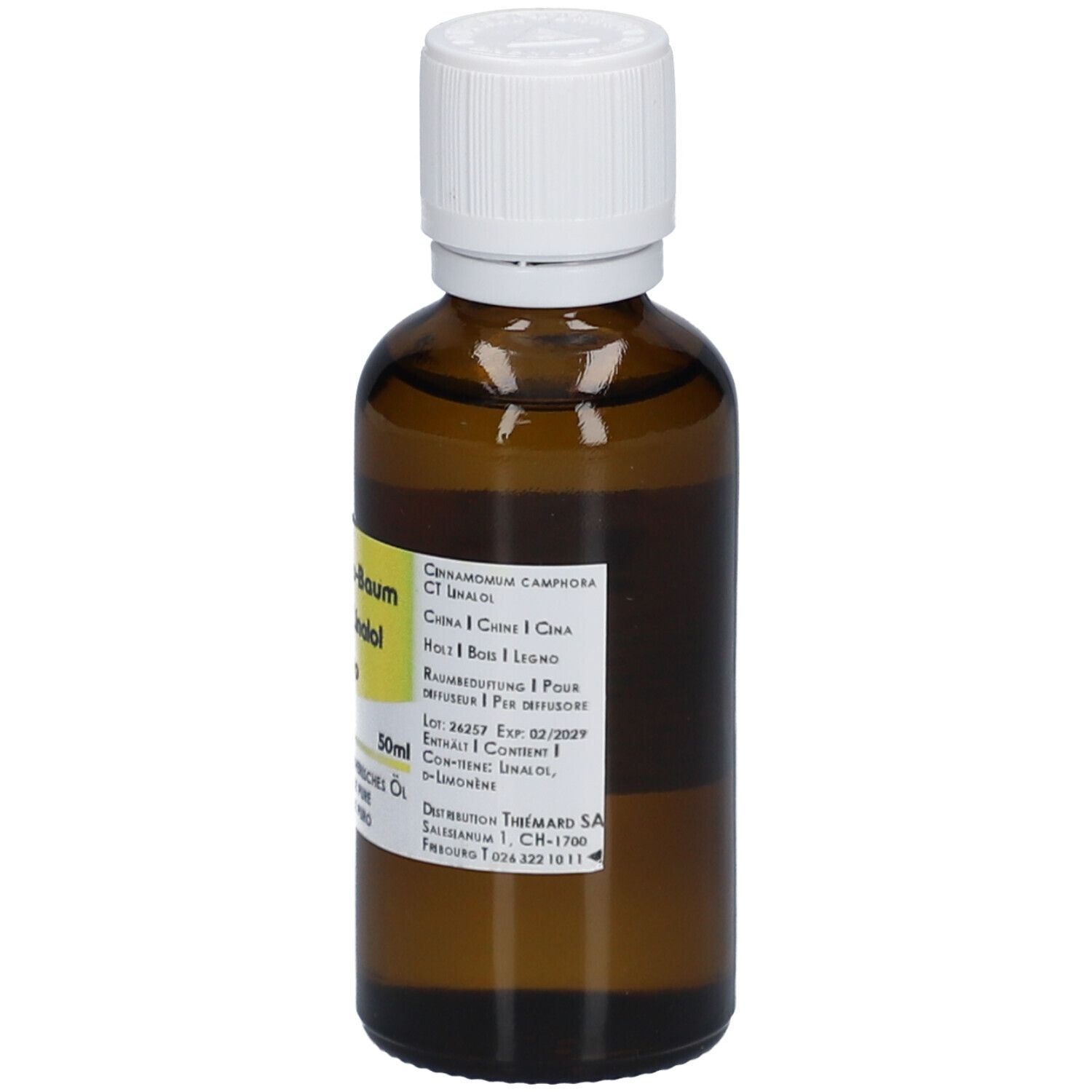 Braune Glasflasche mit weißem Deckel. Etikett mit Produktbezeichnung und Inhaltsangaben. 50ml.