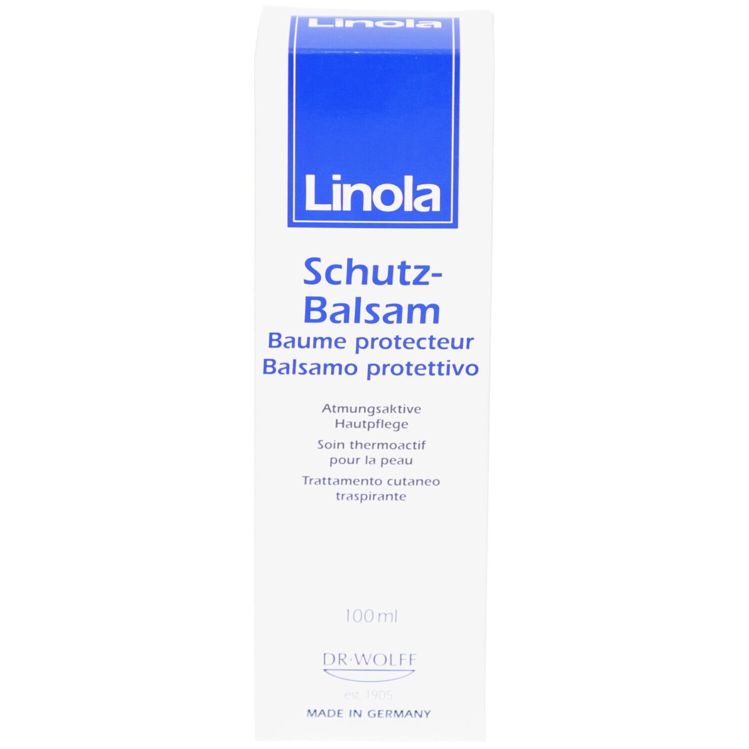Weiße Schachtel mit blauem Streifen. Aufschrift Linola, Schutz-Balsam. 100ml. Dr. Wolff.
