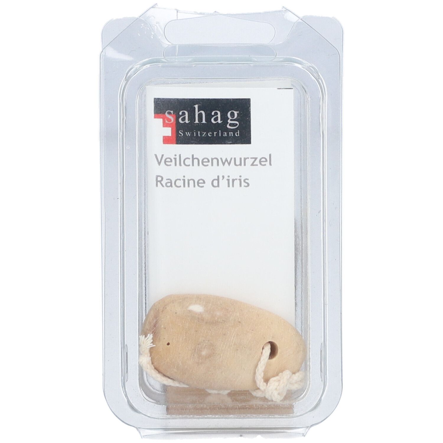 Produkt in transparenter Verpackung. Beige Wurzel mit Kordel. Auf weißem Etikett steht 'sahag' und 'Veilchenwurzel'.