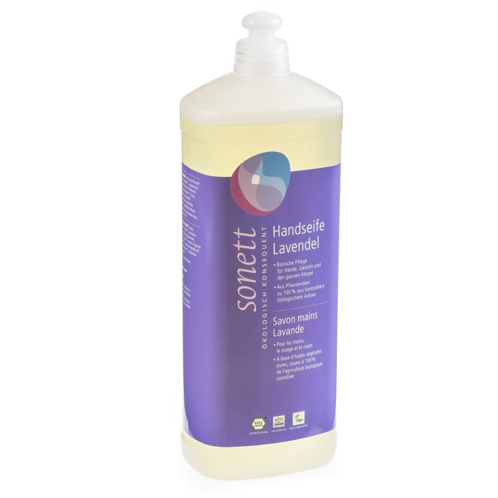 Flasche Flüssigseife Lavendel. Weißer Spender, lila Etikett mit Produktinformationen und Logo. Ökologische Konsequenz.