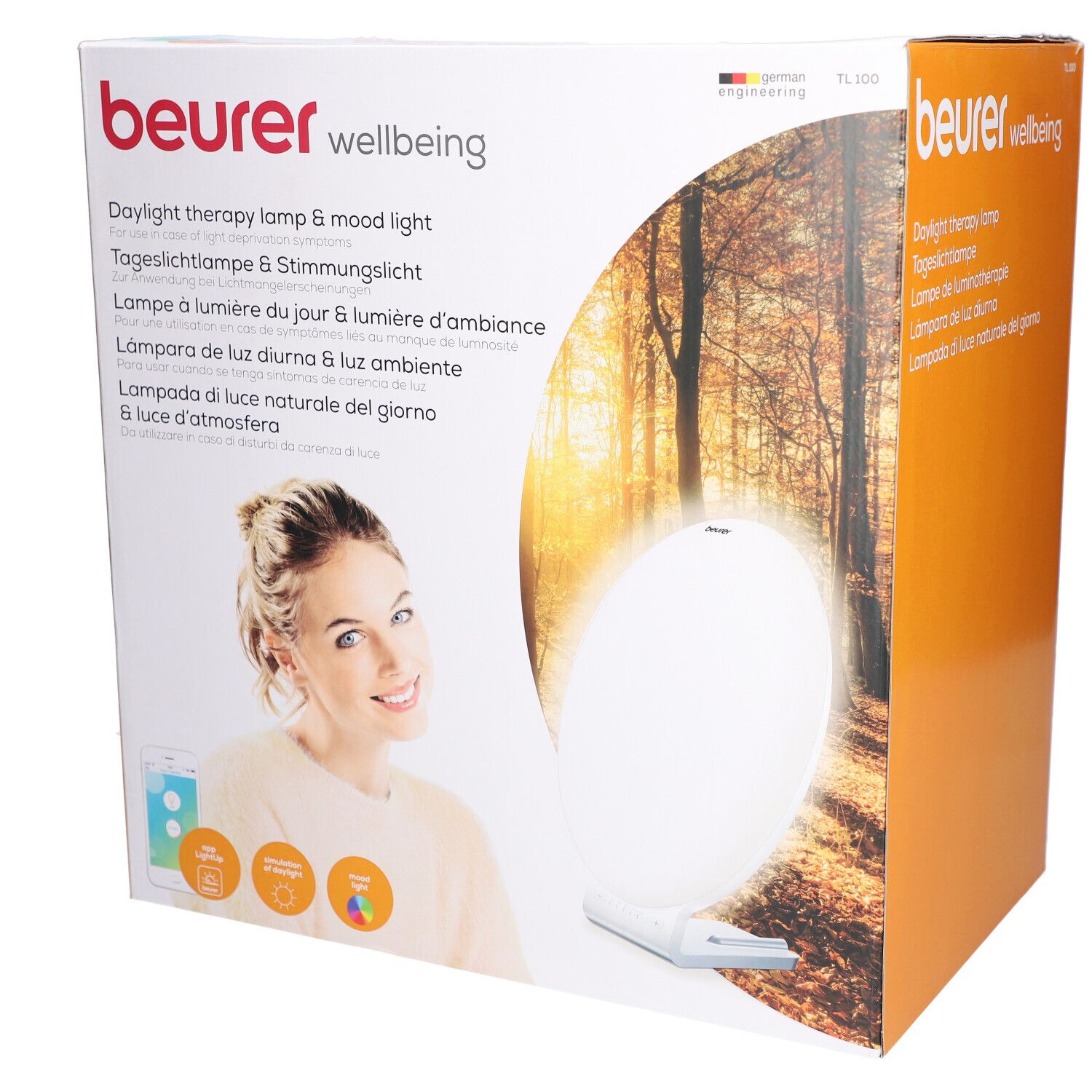 Beurer TL 100 Verpackung. Aufdruck: Tageslichtlampe & Stimmungslich. Frau mit Smartphone. Produktabbildung.