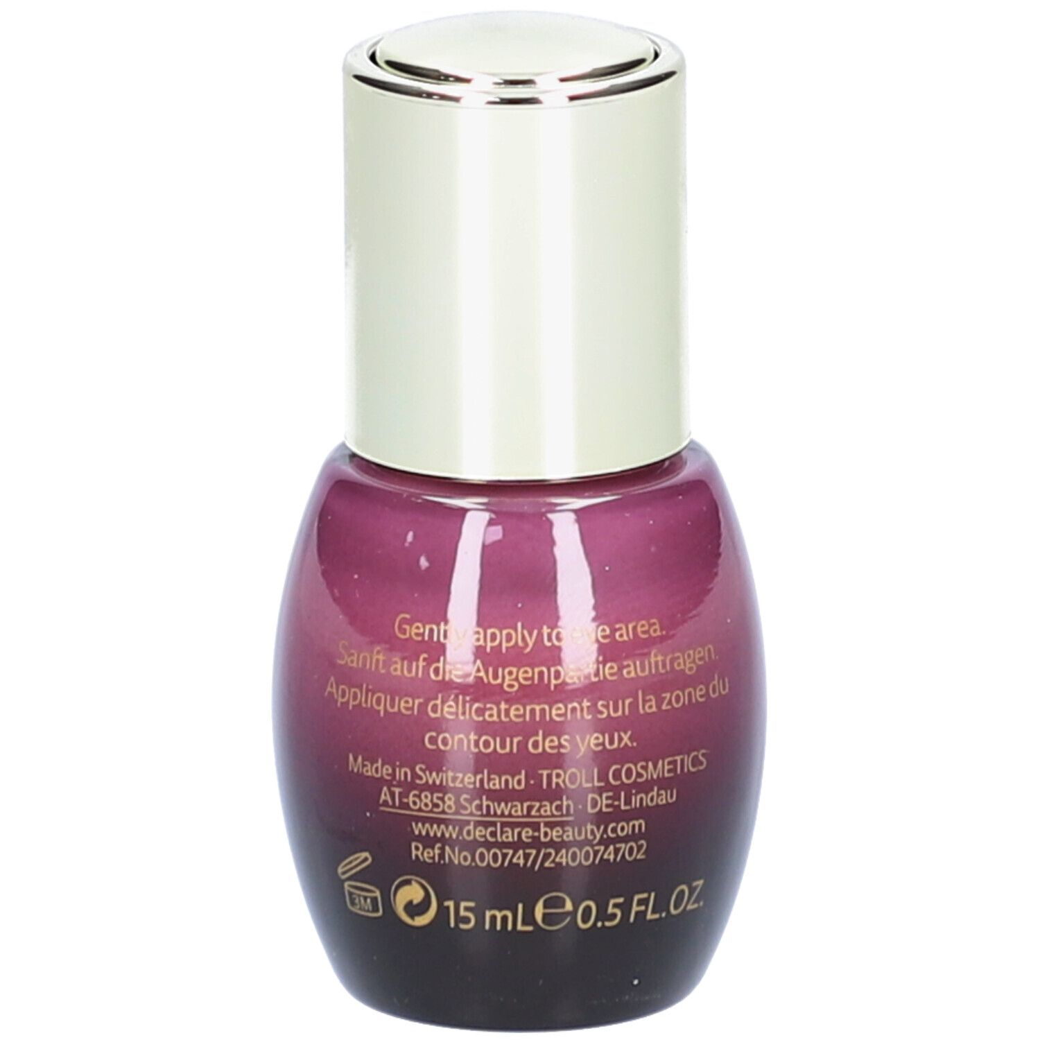 Violette Flasche mit silbernem Deckel. Text: Sanft auf die Augenpartie auftragen. 15 ml.