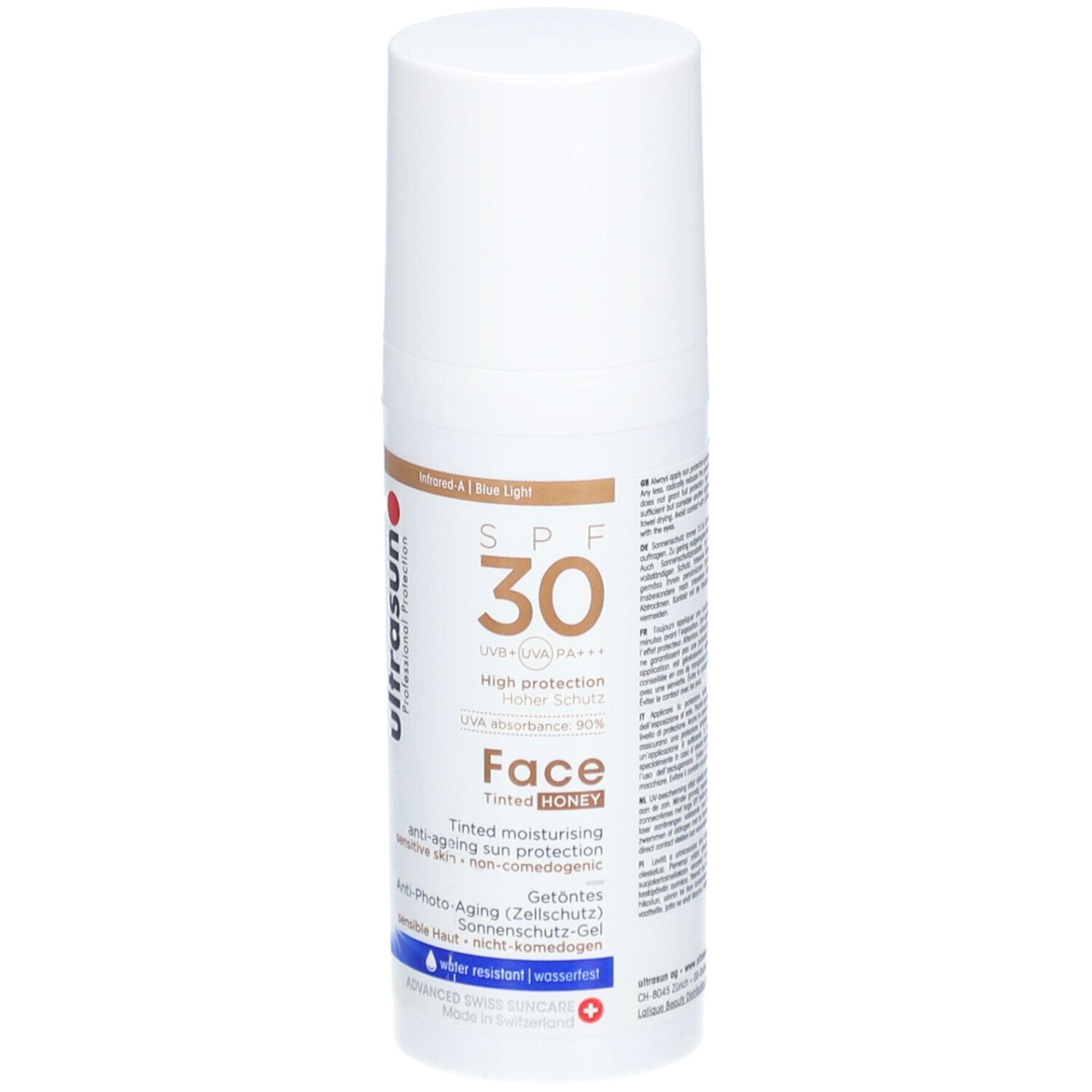 Weiße Flasche mit braunem Deckel. Aufschrift: ultrasun, SPF 30, Face Tinted Honey. Schweizer Kreuz.