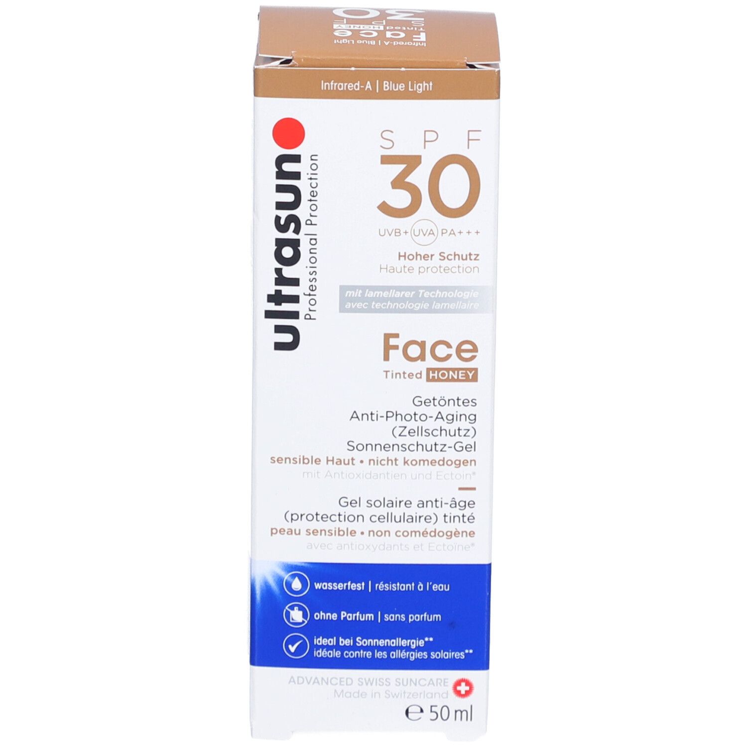 Produktverpackung mit Flasche. Aufschrift: ultrasun, SPF 30, Face Tinted Honey. Schweizer Kreuz. e50ml.