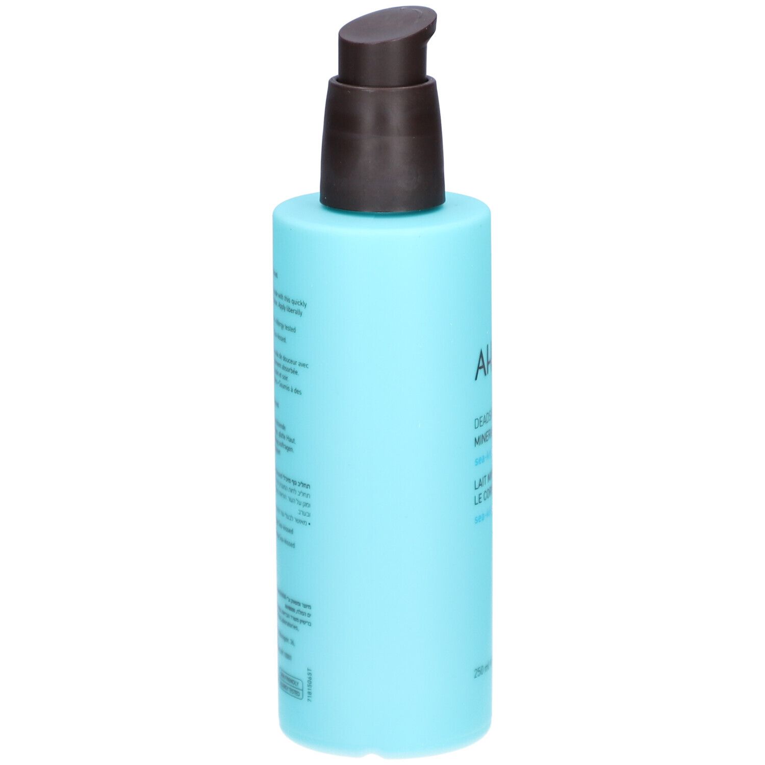 Hellblaue Flasche mit braunem Pumpkopf. Rückseite mit Text in verschiedenen Sprachen.
