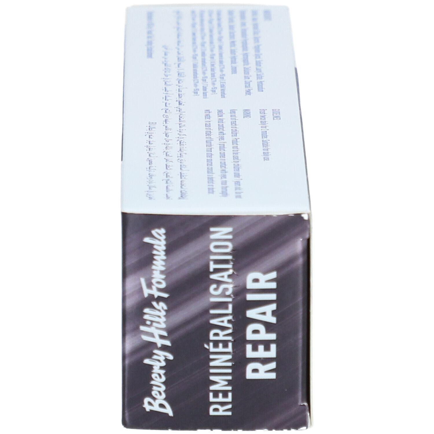 Seitenansicht der Schachtel. Schwarzer Hintergrund, weißer Text. Aufschrift: Beverly Hills Formula, REMINERALISATION REPAIR.